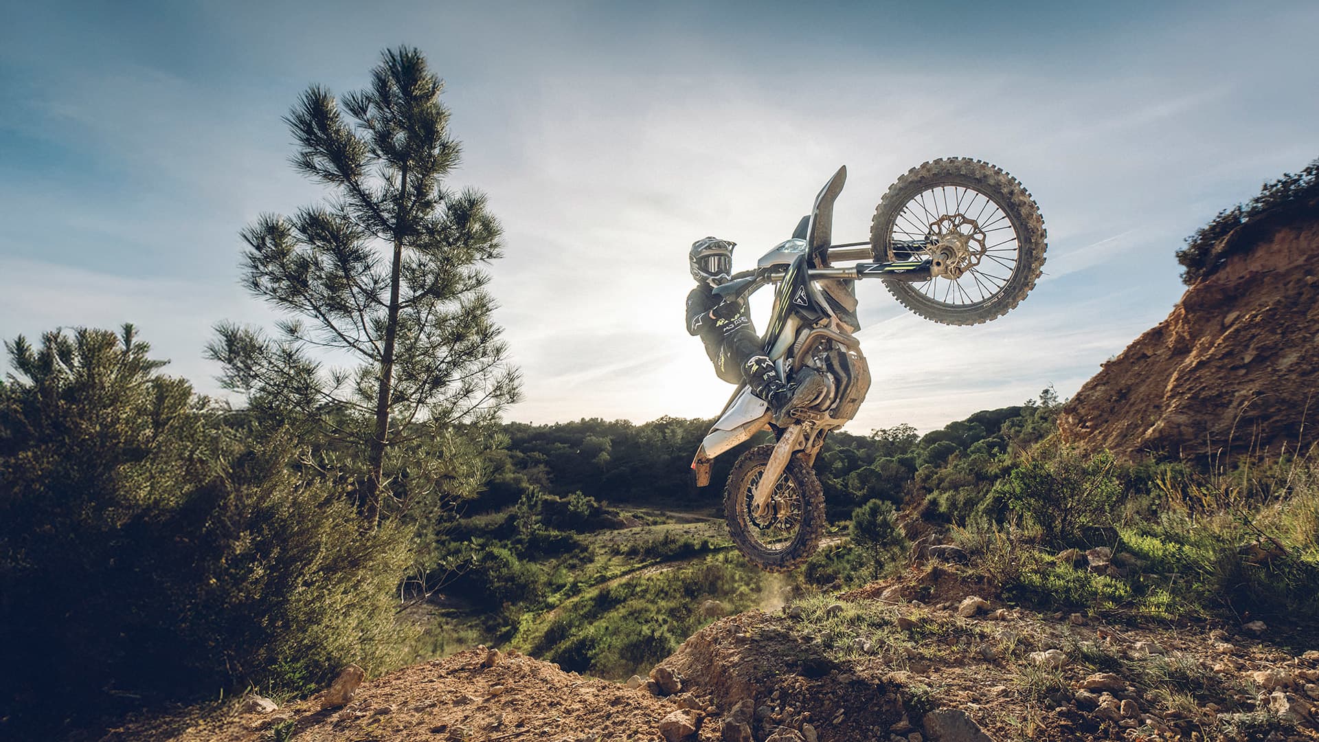 Rider on Triumph TF 450-E in the air