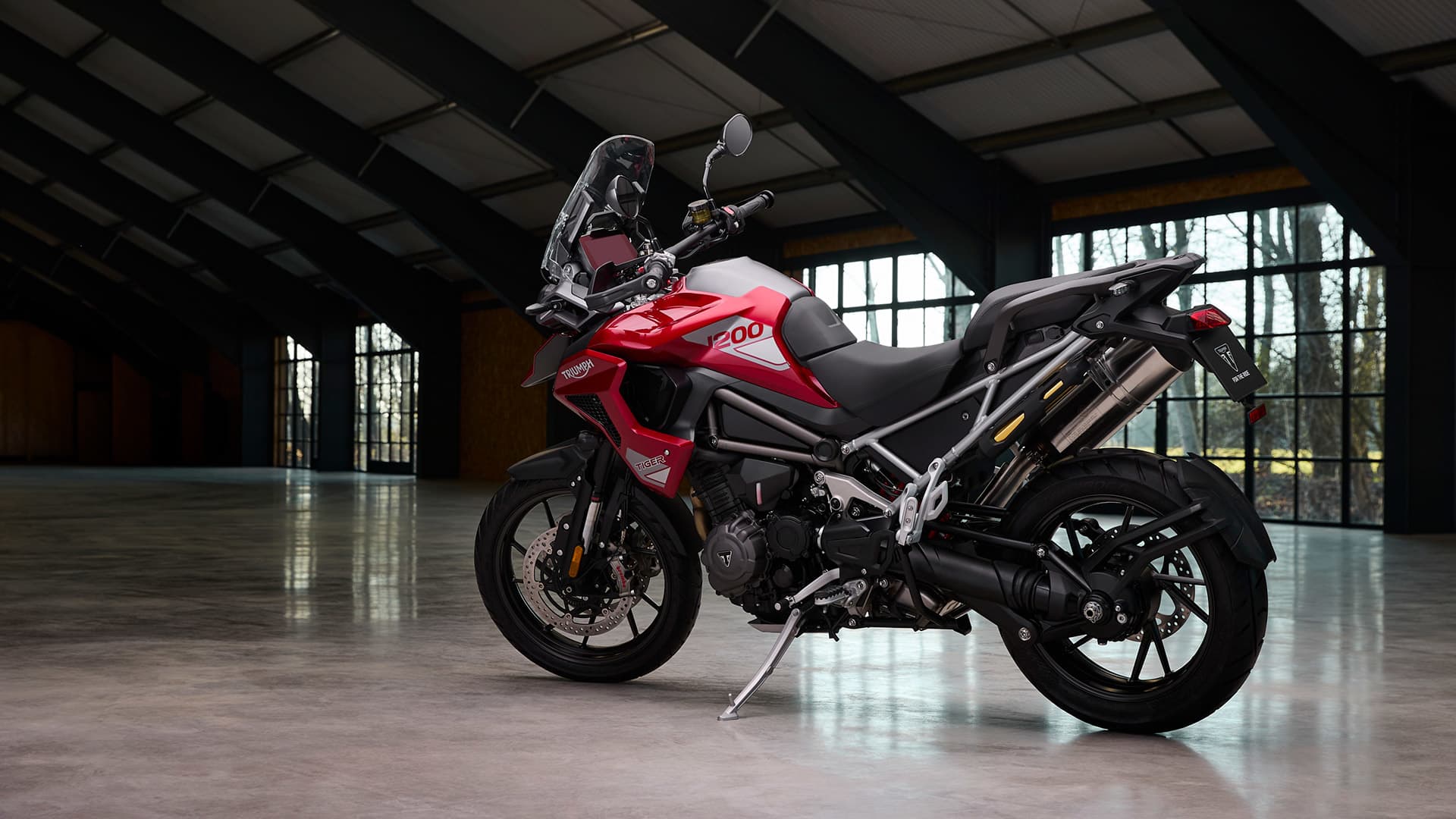 Angled left hand side view of Triumph Tiger 1200 GT Pro in Carnival red