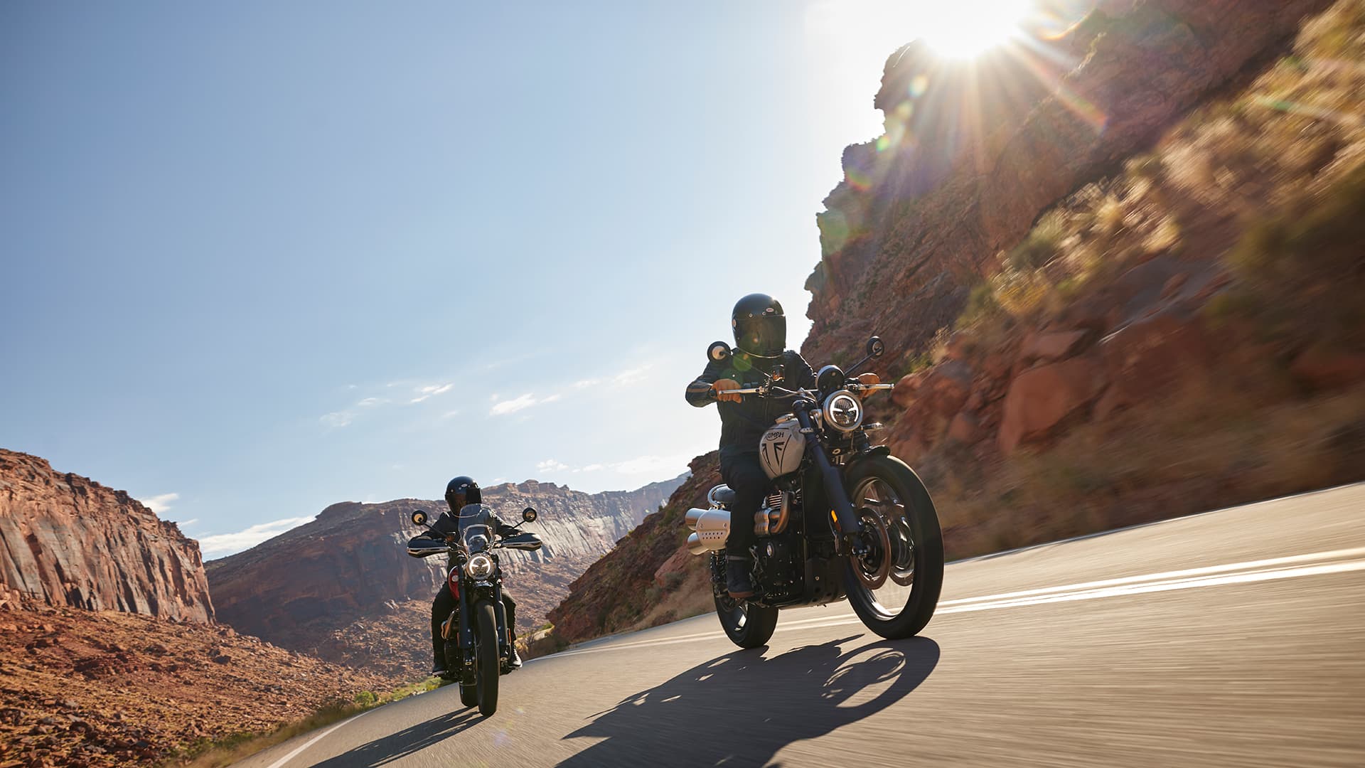 Triumph Scrambler 1200 X riding on road