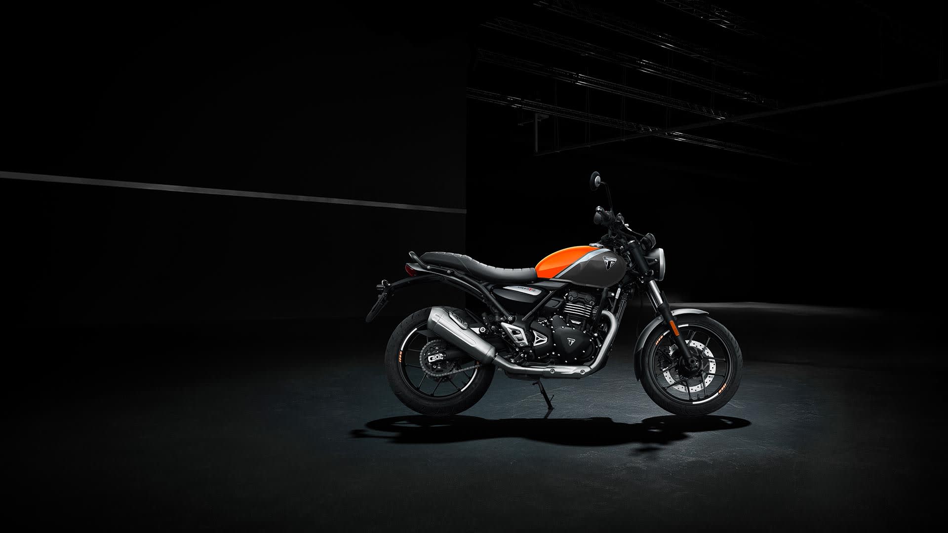 Triumph X Bajaj Speed T4 in Baja Orange 2025
