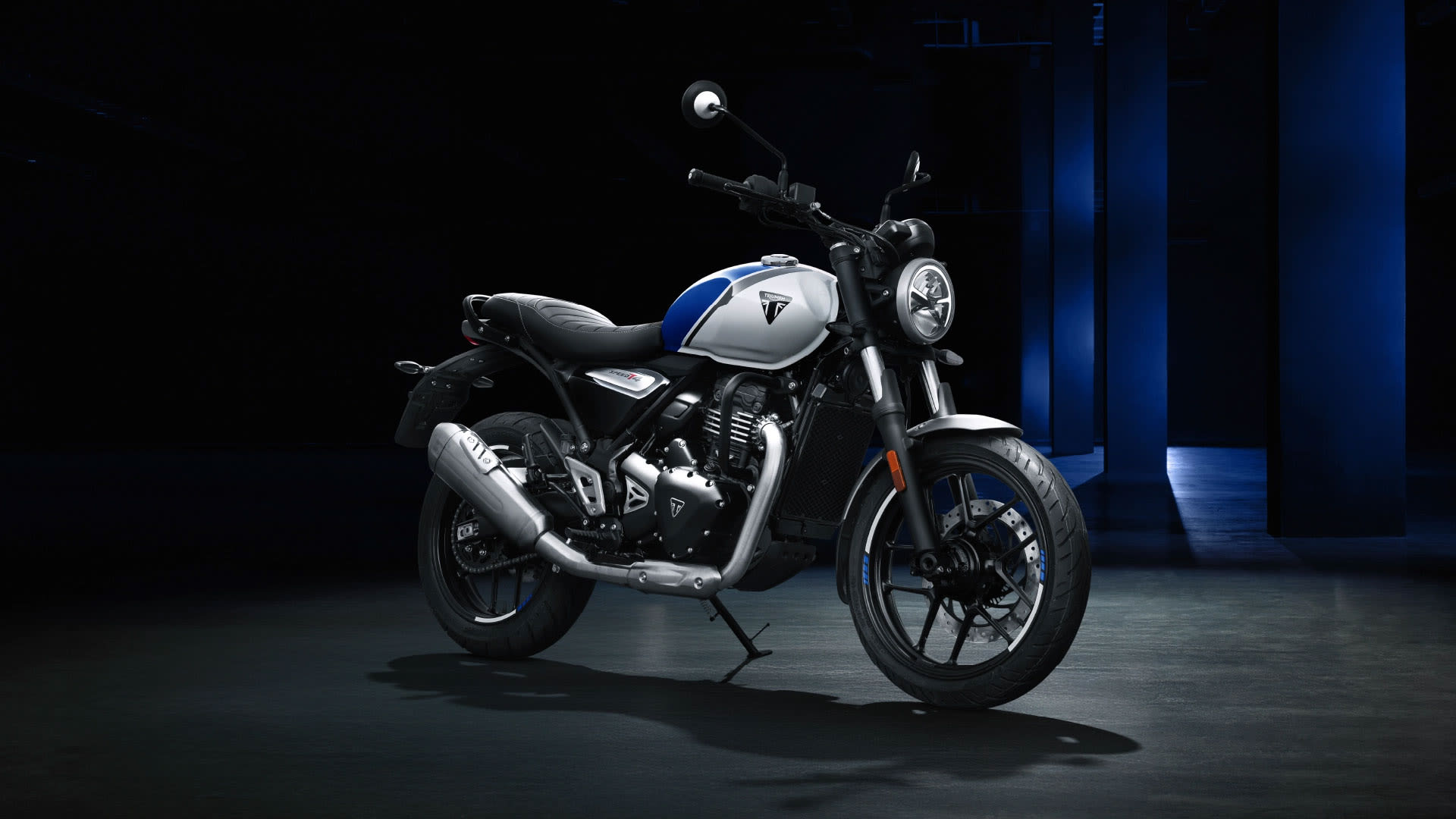 Triumph X Bajaj Speed T4 in Caspian Blue and Pearl Metallic White Static shot