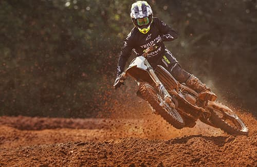 Triumph TF250 X rider in action