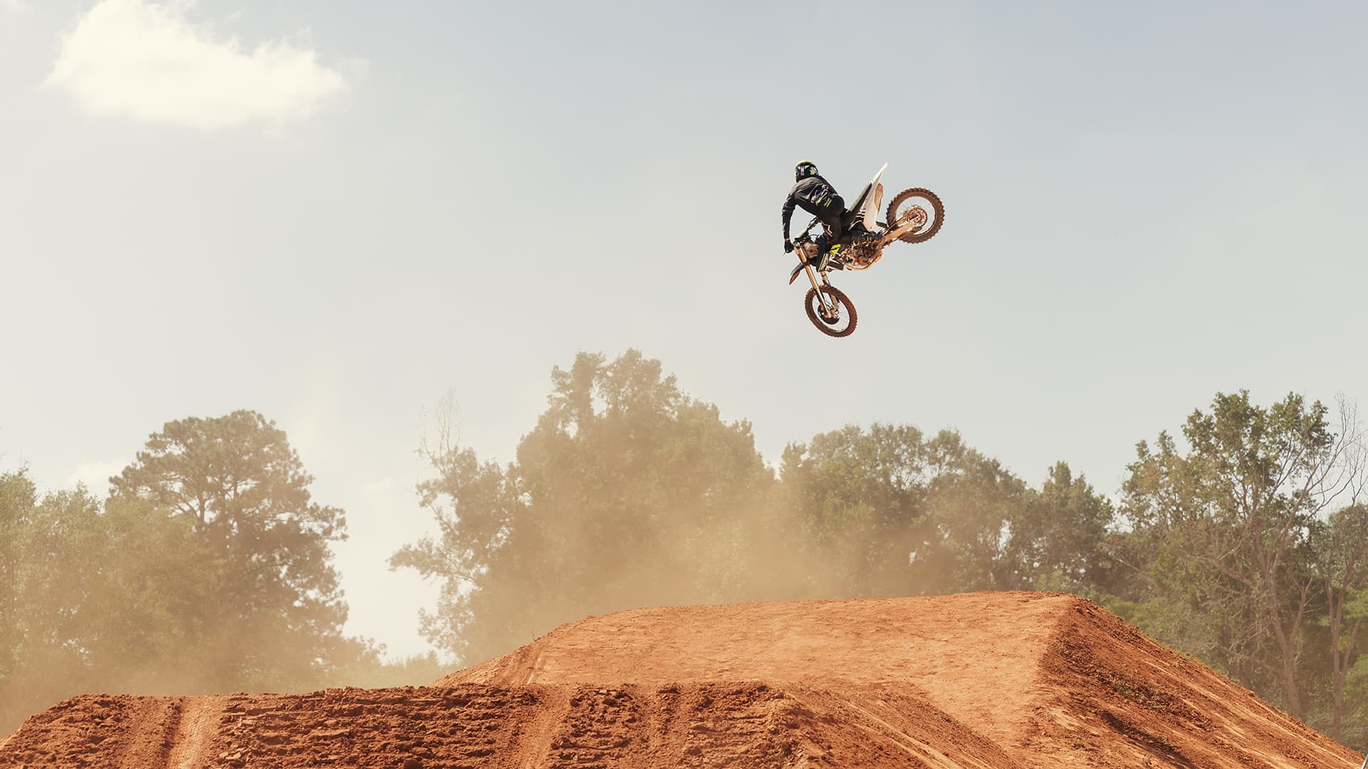 Rider whipping a Triumph TF 250-Xs riding on Motocross track