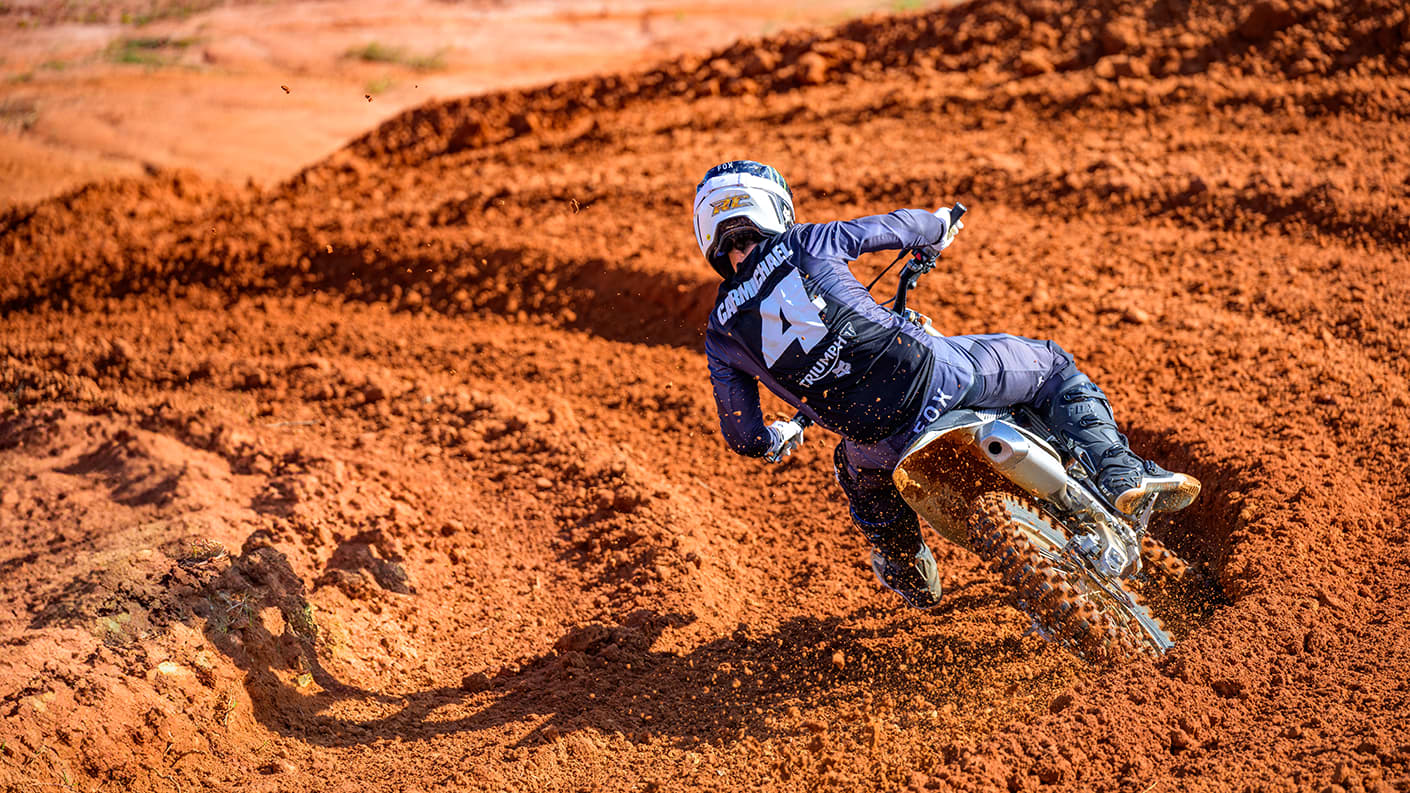 Ricky Carmichael riding a Triumph motocross bike 