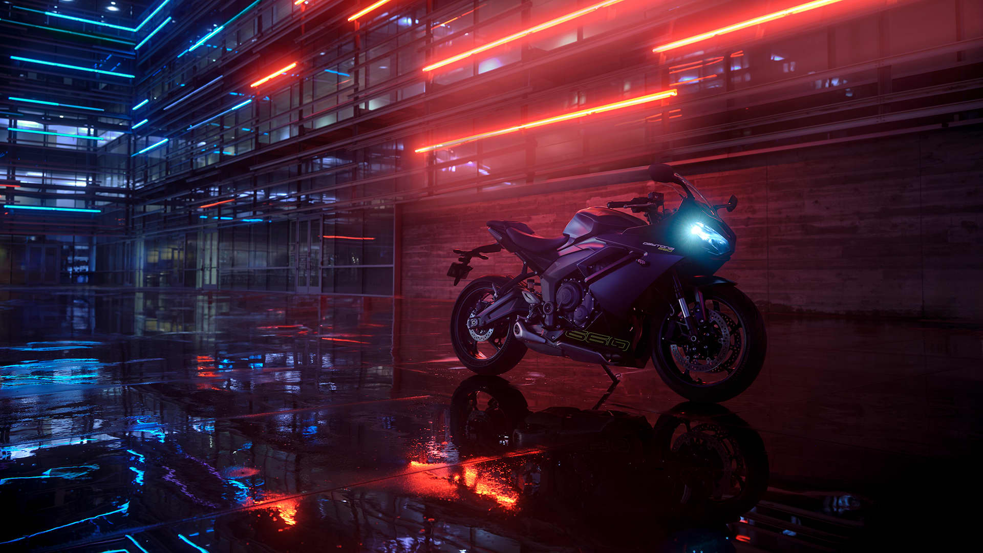 Triumph Daytona 660 in urban setting with Neon lights