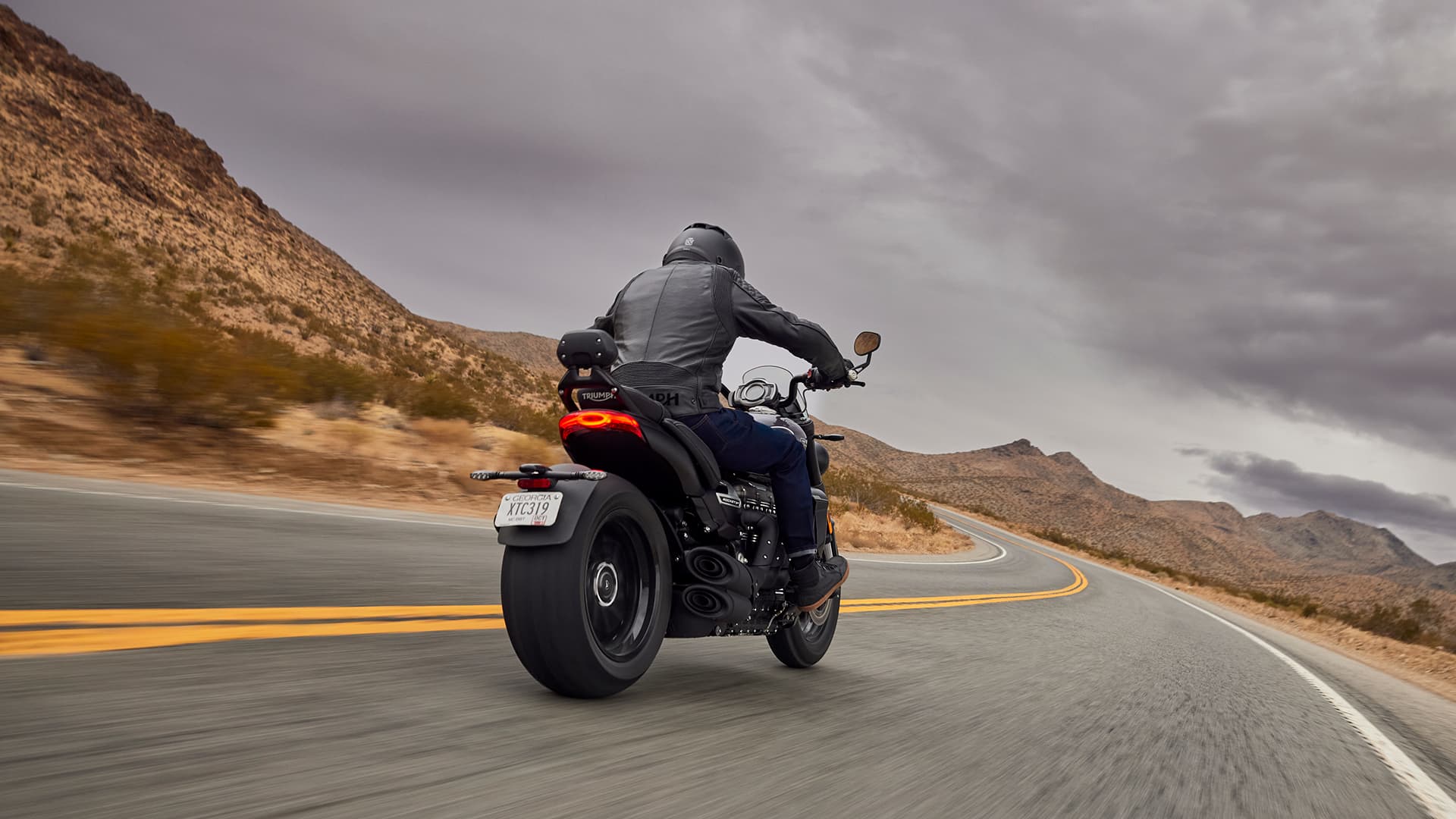 Triumph Rocket 3 Storm GT riding on mountain road