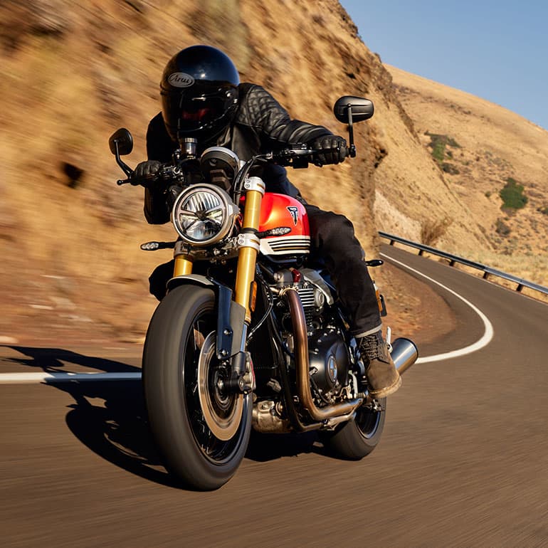 Triumph Speed Twin 1200 RS riding shot on the road