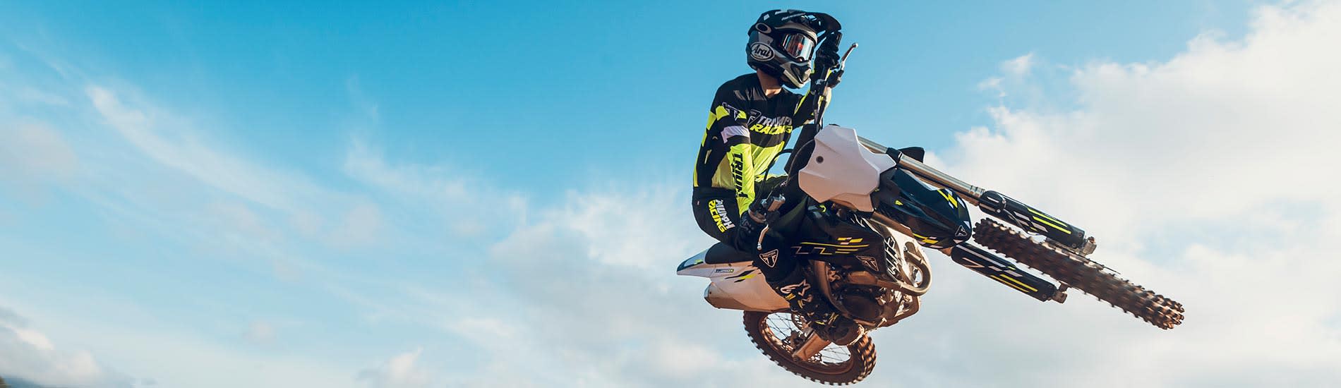 MY26 Triumph TF 250-X riding in air)