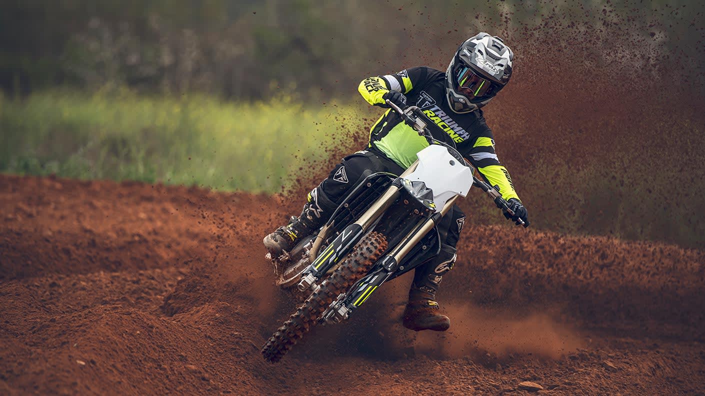 MY26 Triumph TF 250-X rider push hard on dirt track