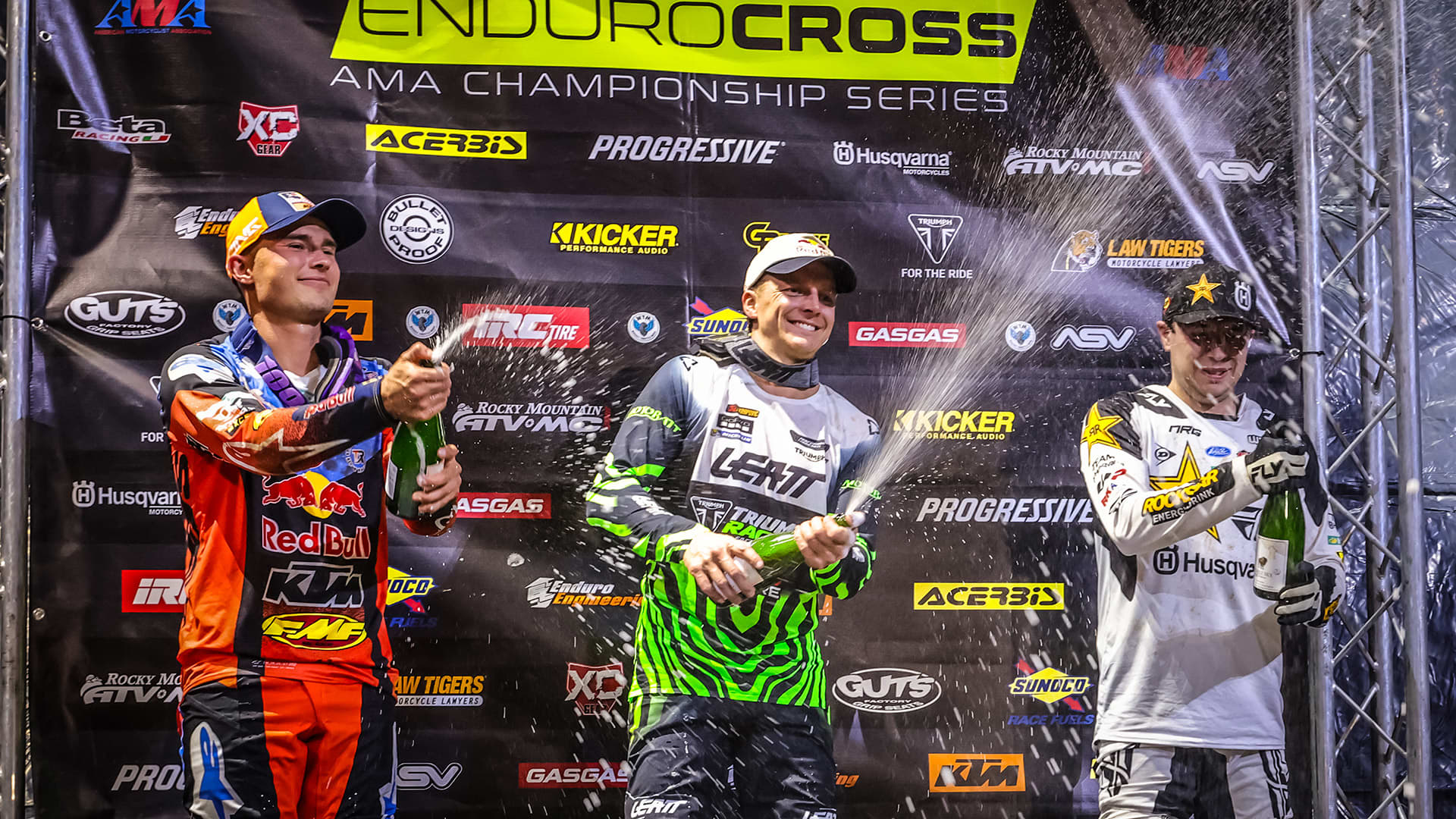 Man spraying champagne in celebration