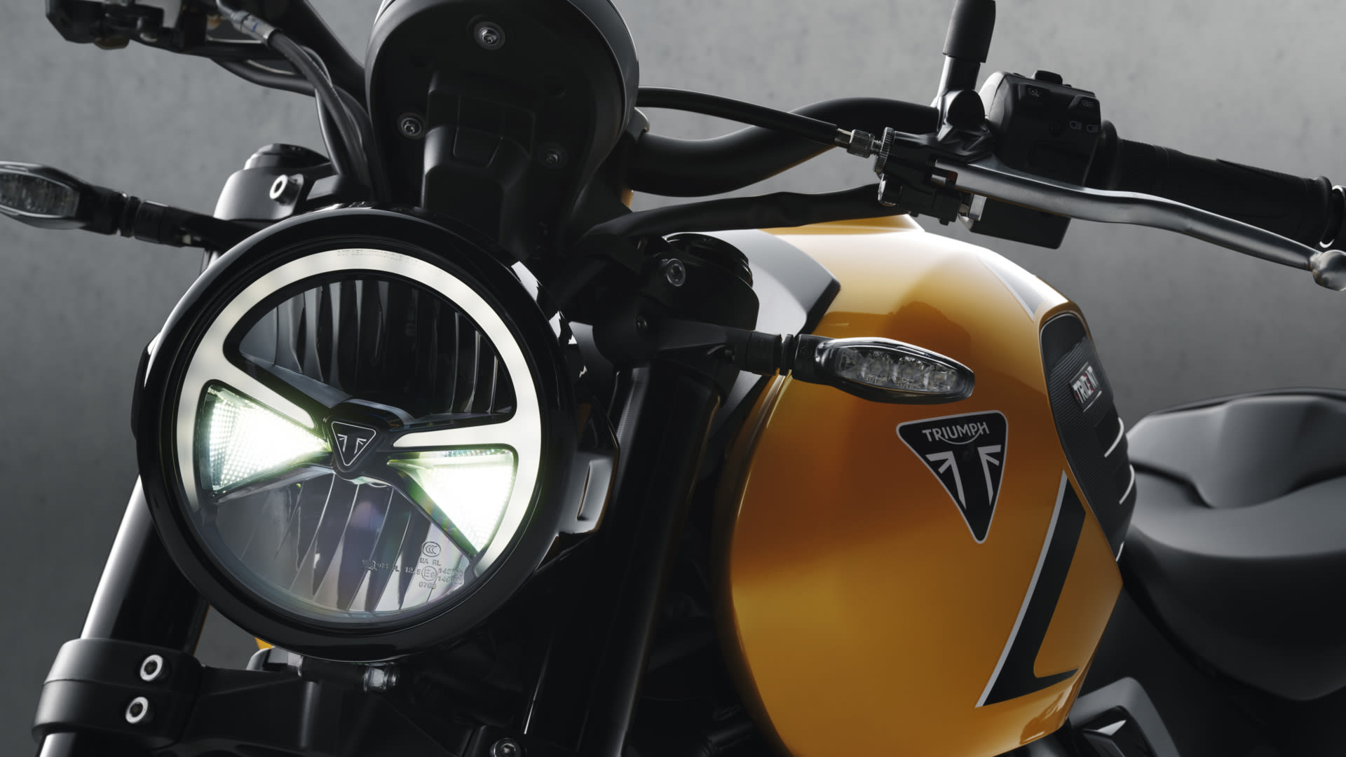 Front view close up shot of Triumph Trident 660 head light