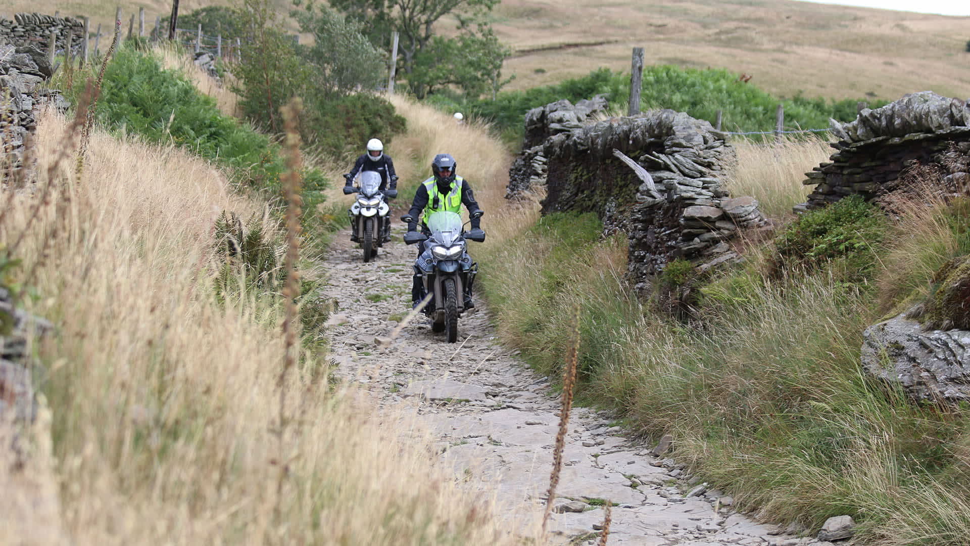 Triumph Tiger 800 experience riding through a rocky trail 