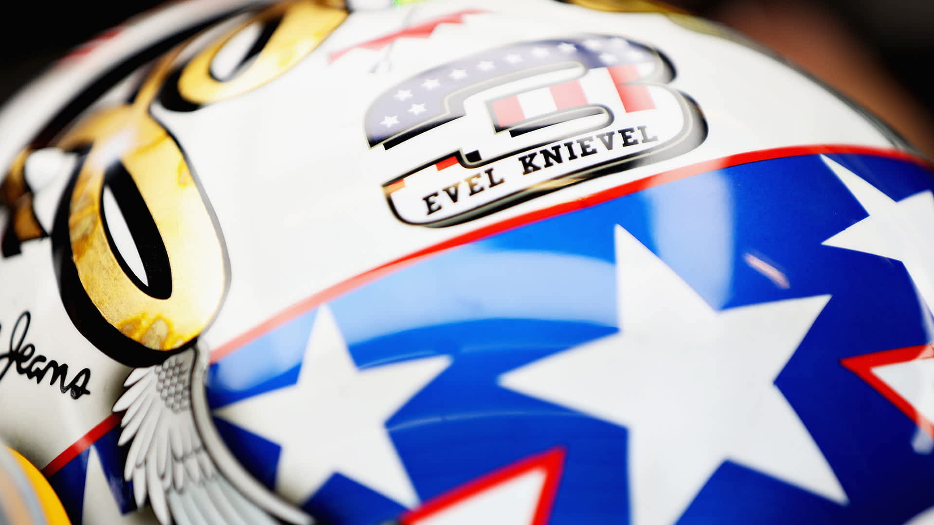 Detail shot showing the Evel Knievel branding on helmet