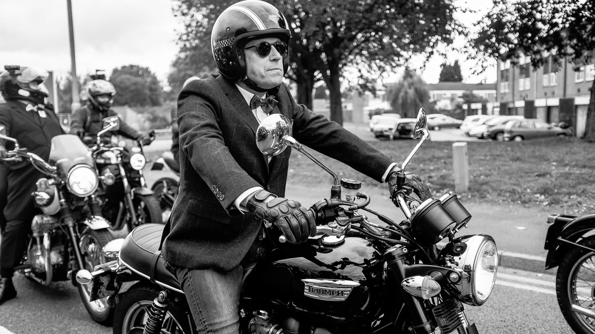 Triumph Rider taking in the experience of a Distinguished Gentlemen's Ride