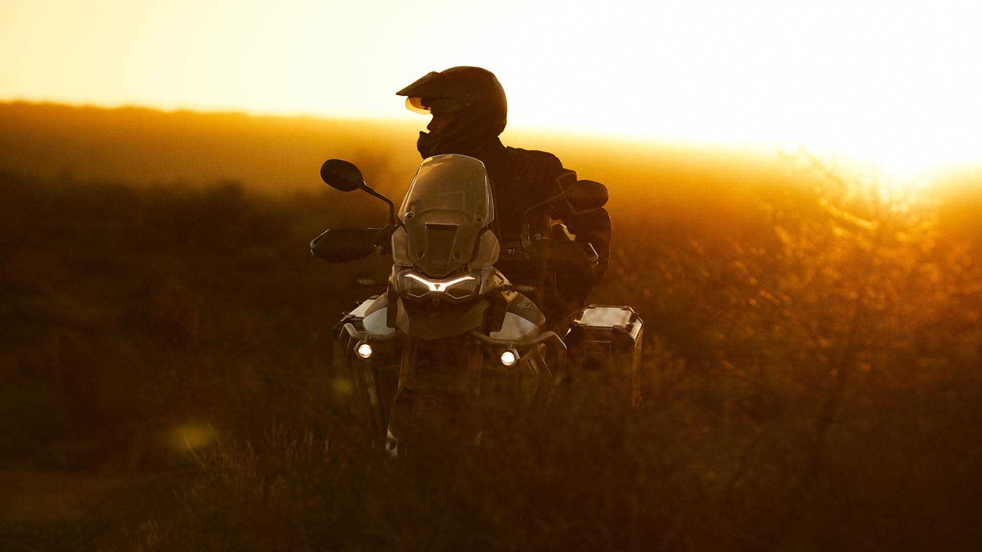 Sunset shot of Triumph Tiger Rally Pro in Matt Khaki Green