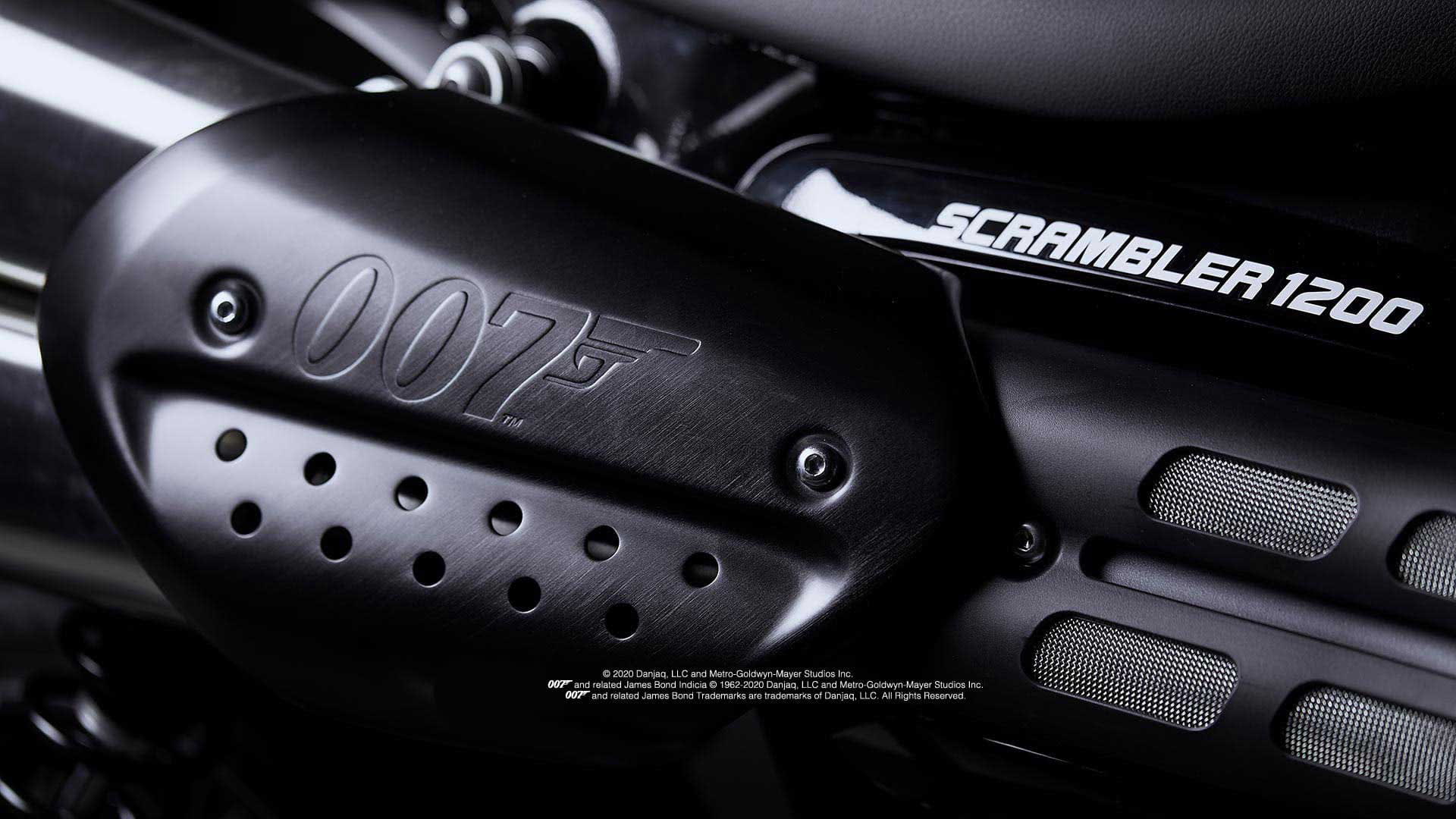 Close up of the Triumph Scrambler 1200 Bond Edition exhaust number board with pressed 007 branding