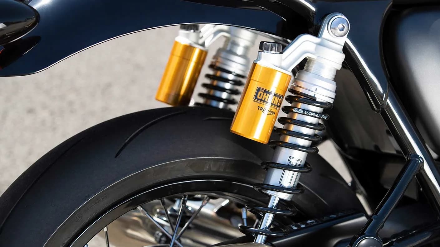Close-up shot of the Triumph Thruxton RS's fully adjustable Öhlins rear suspension