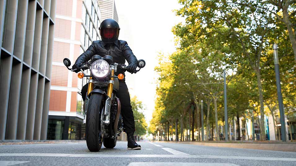 Rider on the new Triumph Thruxton RS on city streets