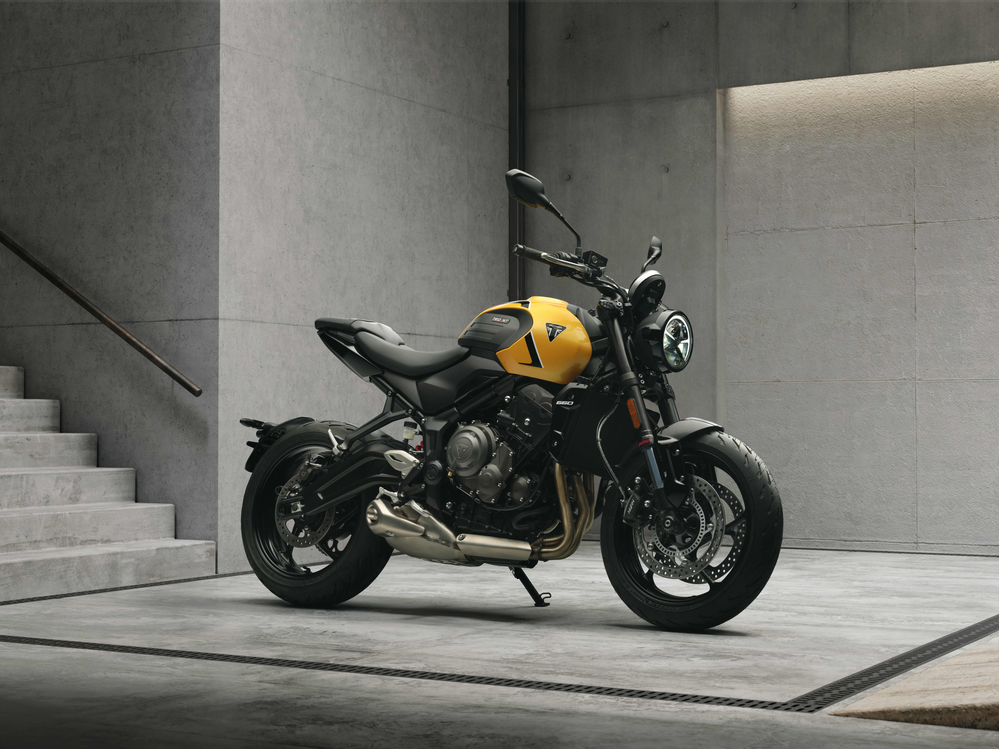 Triple the Thrill. Upgraded. Right hand side of Trident 660 in Cosmic yellow