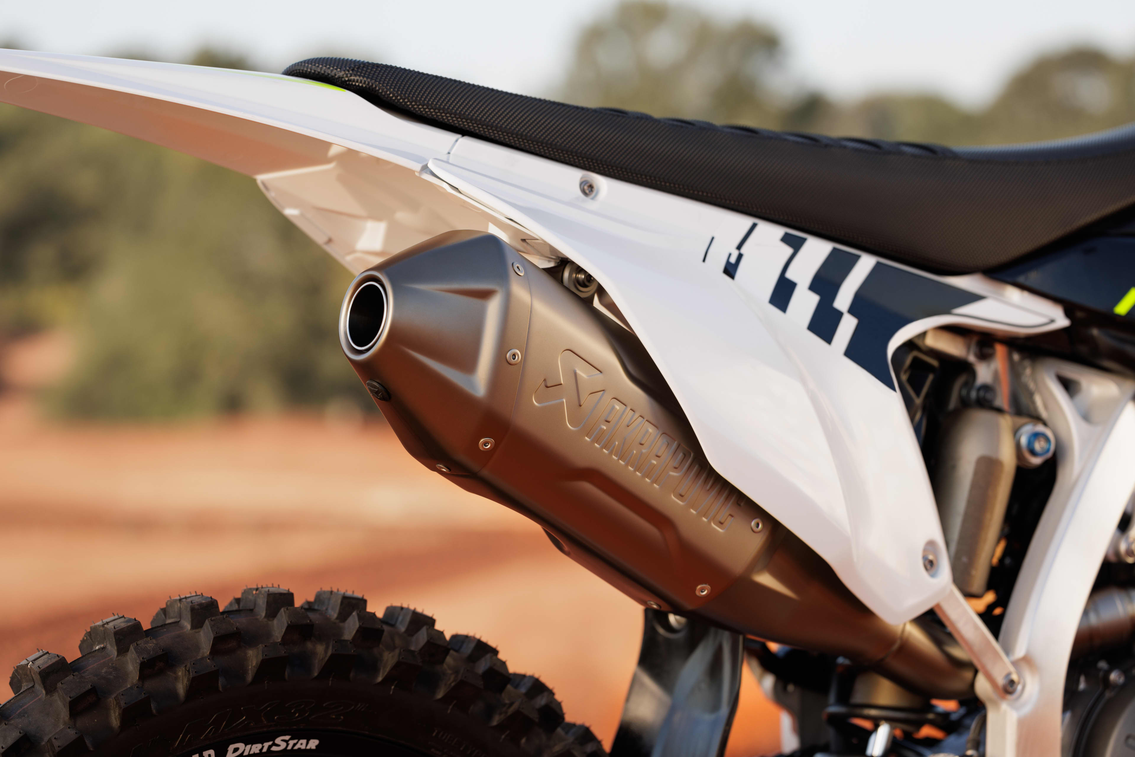 Close up of the Triumph TF 250-X (MY25)'s Akrapovič Titanium System