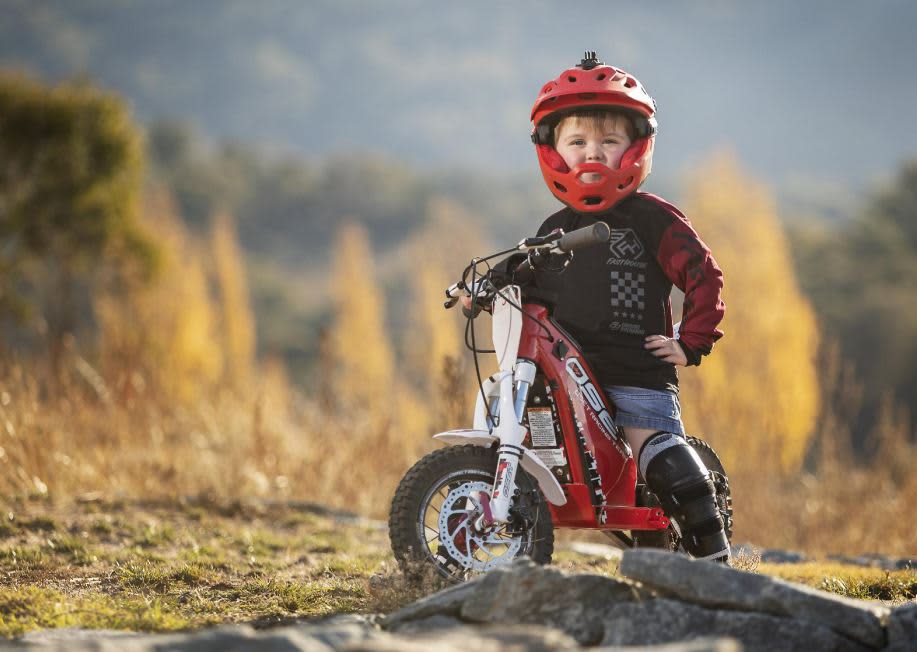 A young child aged between 3-5 sitting on the OSET 12.5R