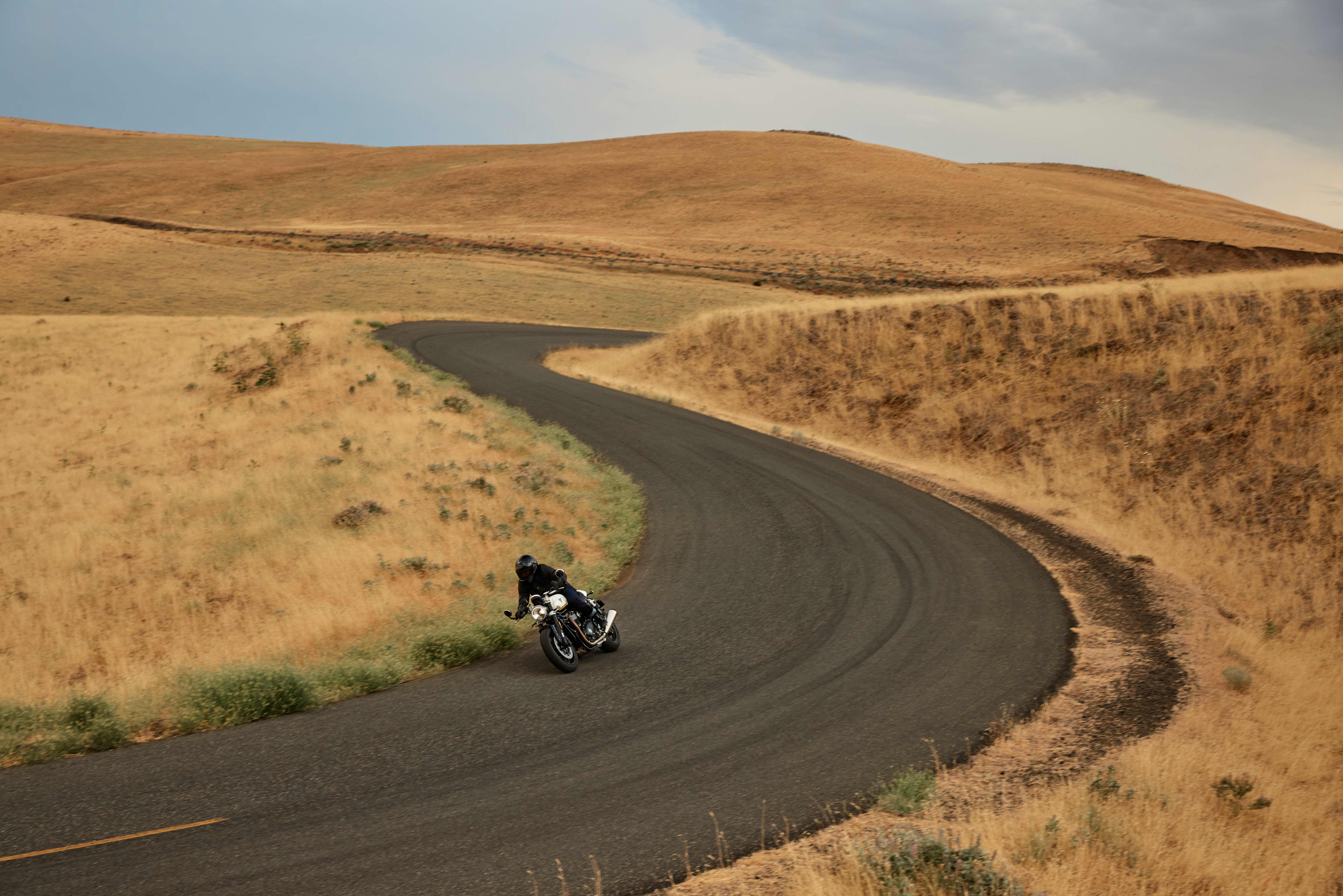 Distant riding shot of Triumph Speed Twin 1200