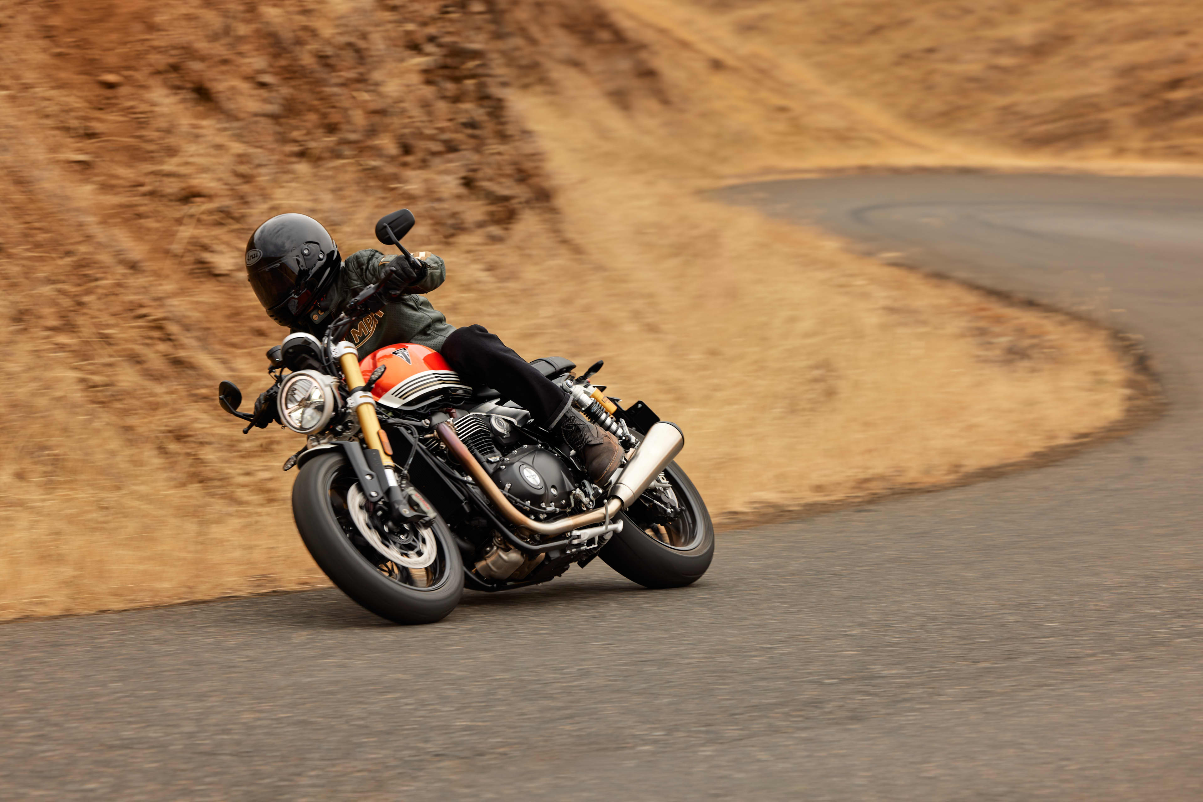 Triumph Speed Twin 1200 riding on twisty road