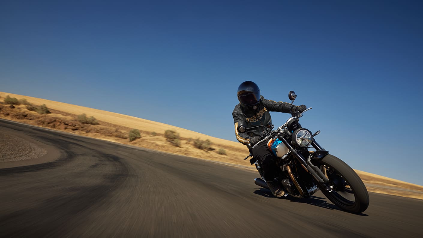 Angled front view action shot of rider on Triumph Speed Twin 900