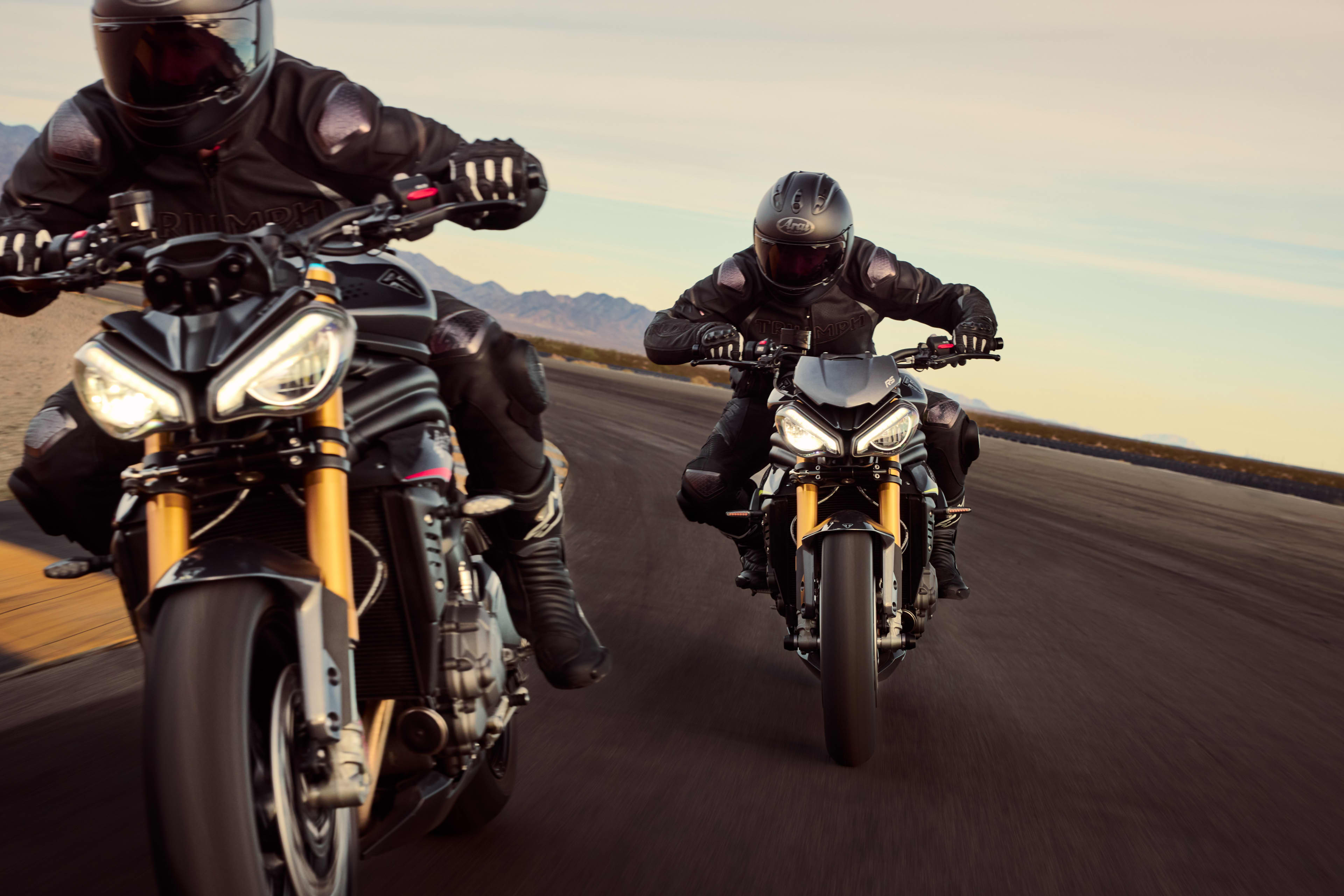 Two riders on the Speed Triple 1200 RS
