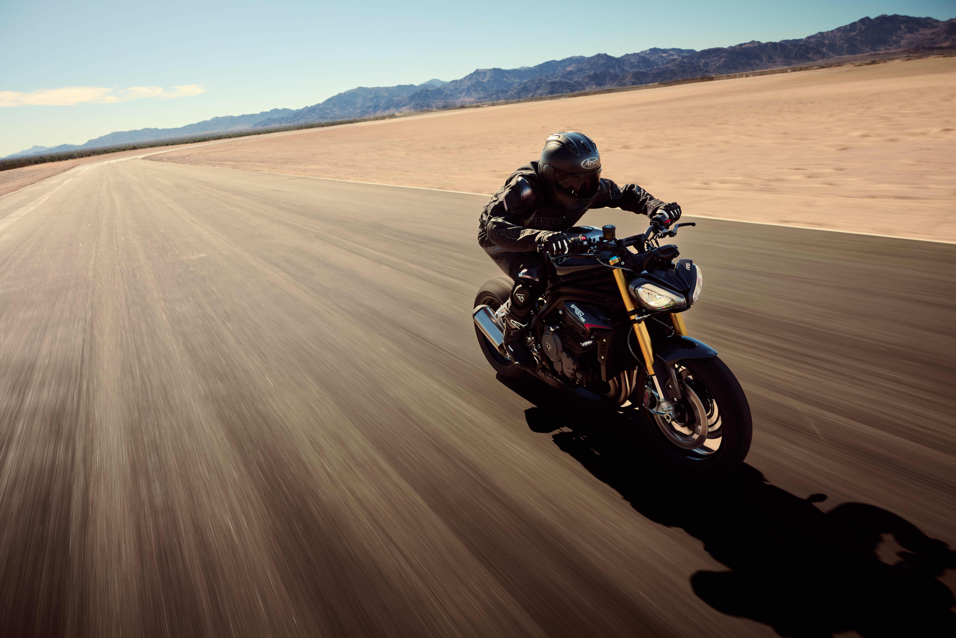 Speed Triple 1200 RS riding on an empty track