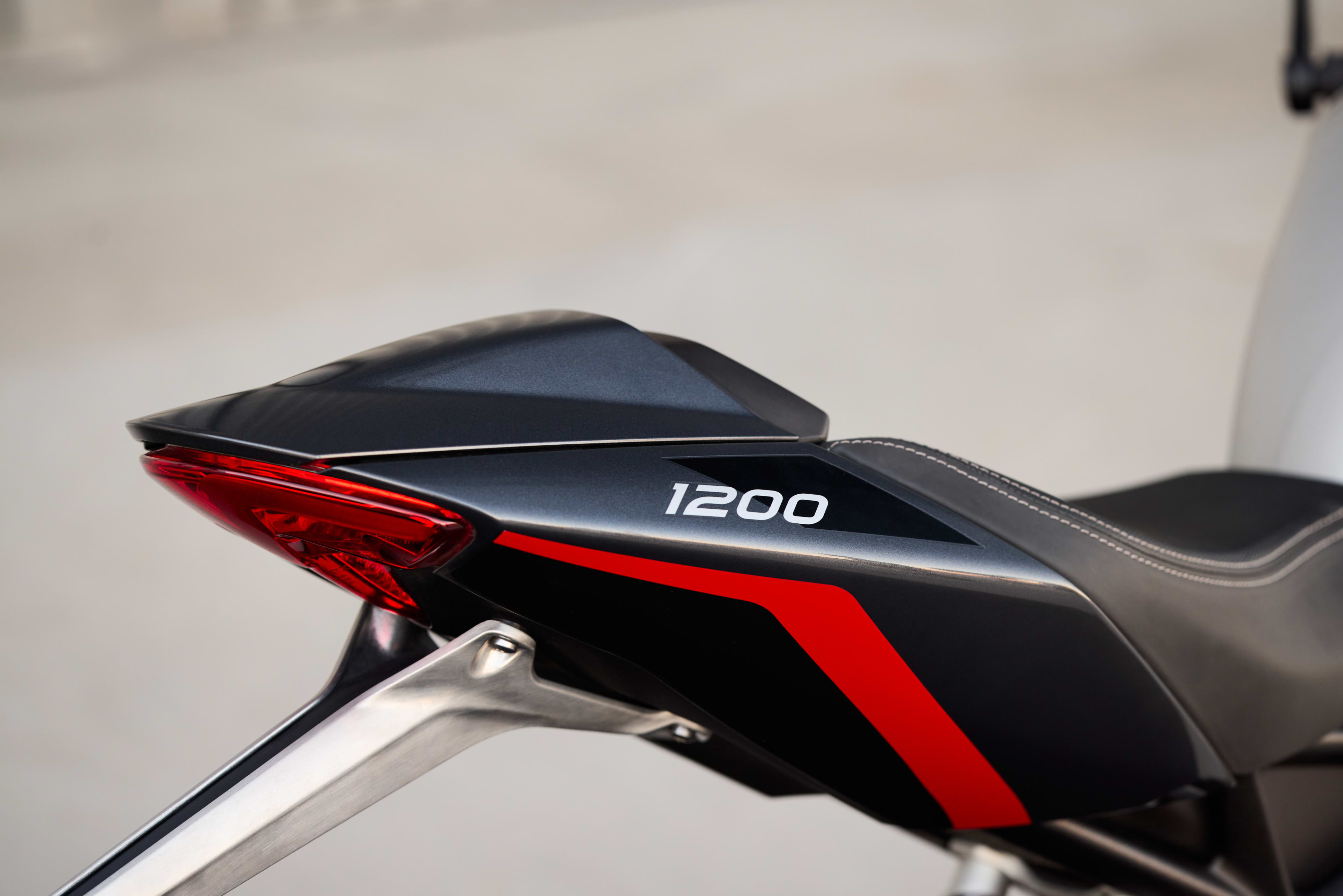 Speed Triple 1200 RS seat cowl at the rear end of the bike