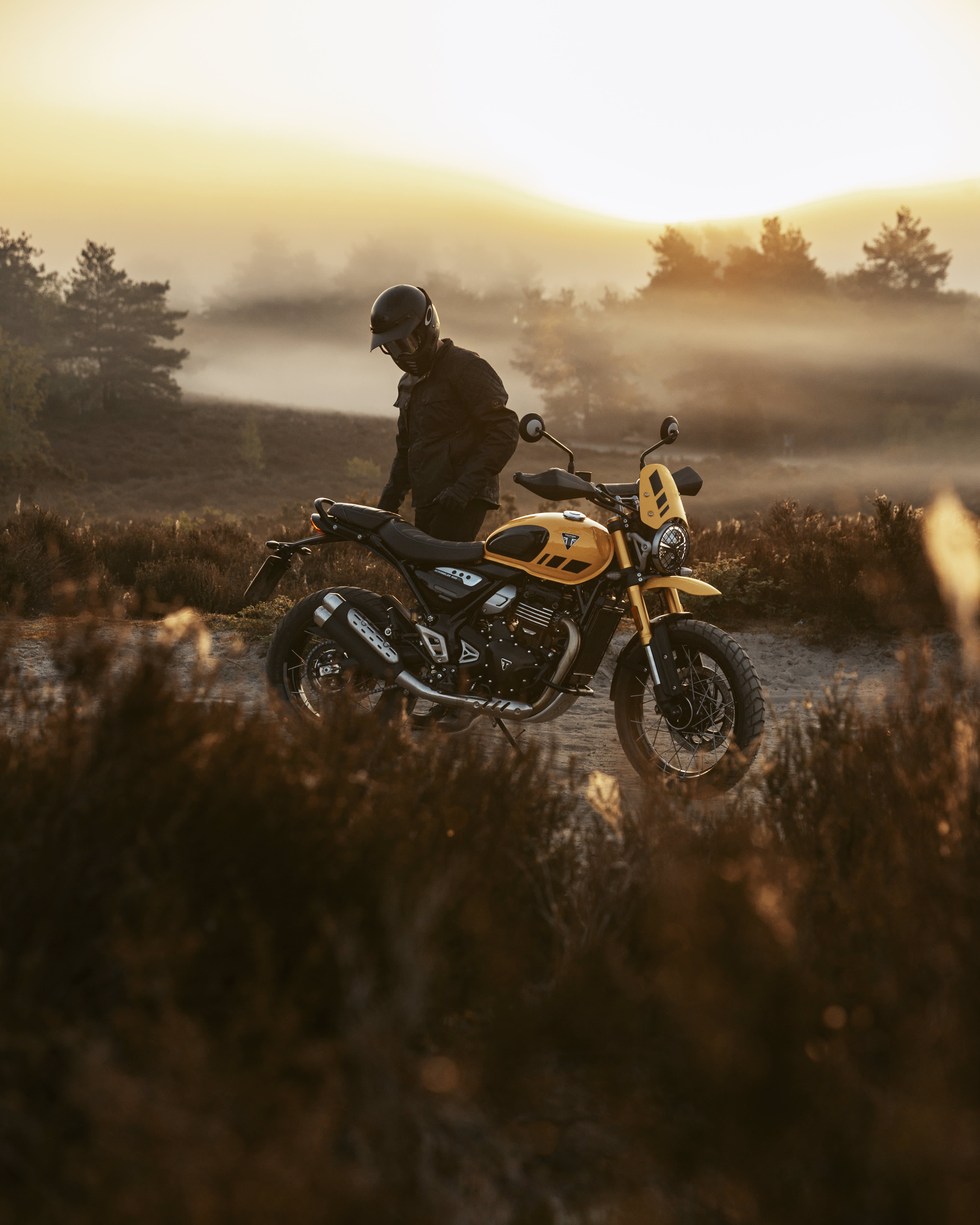 Triumph Scrambler 400 XC with rider 