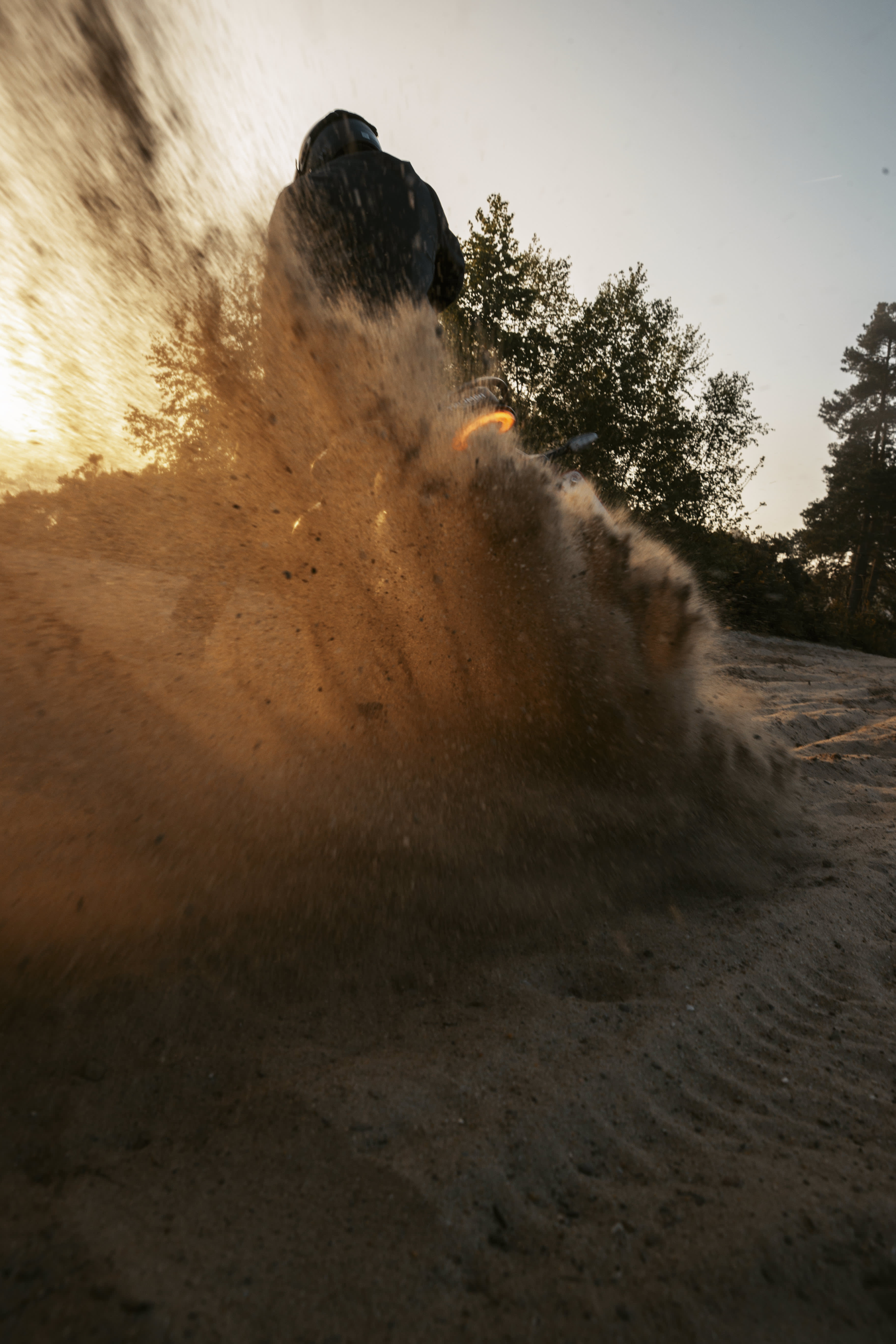 Scrambler 400 XC riding through sand 