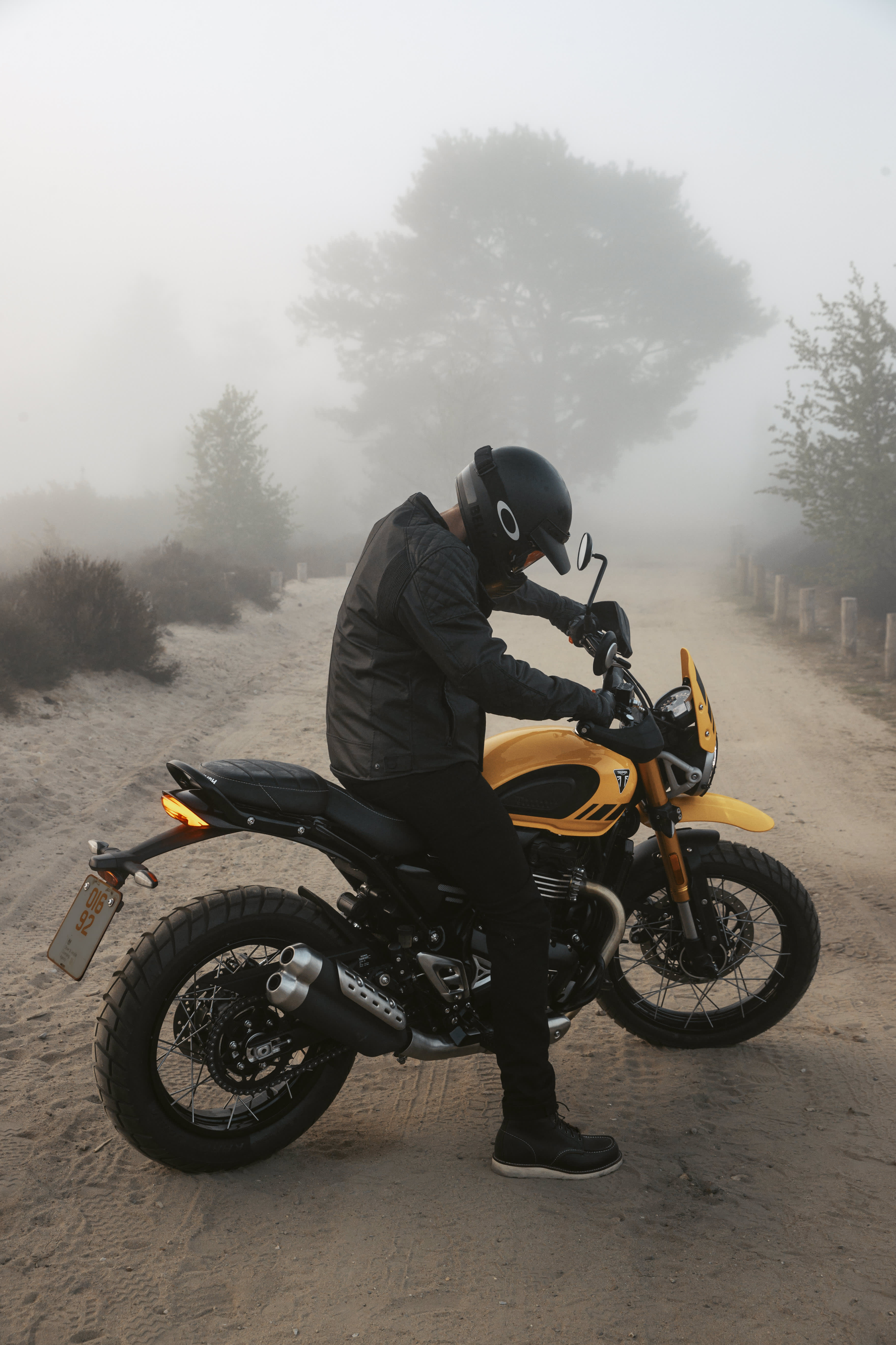 Triumph Scrambler 400 XC with rider 