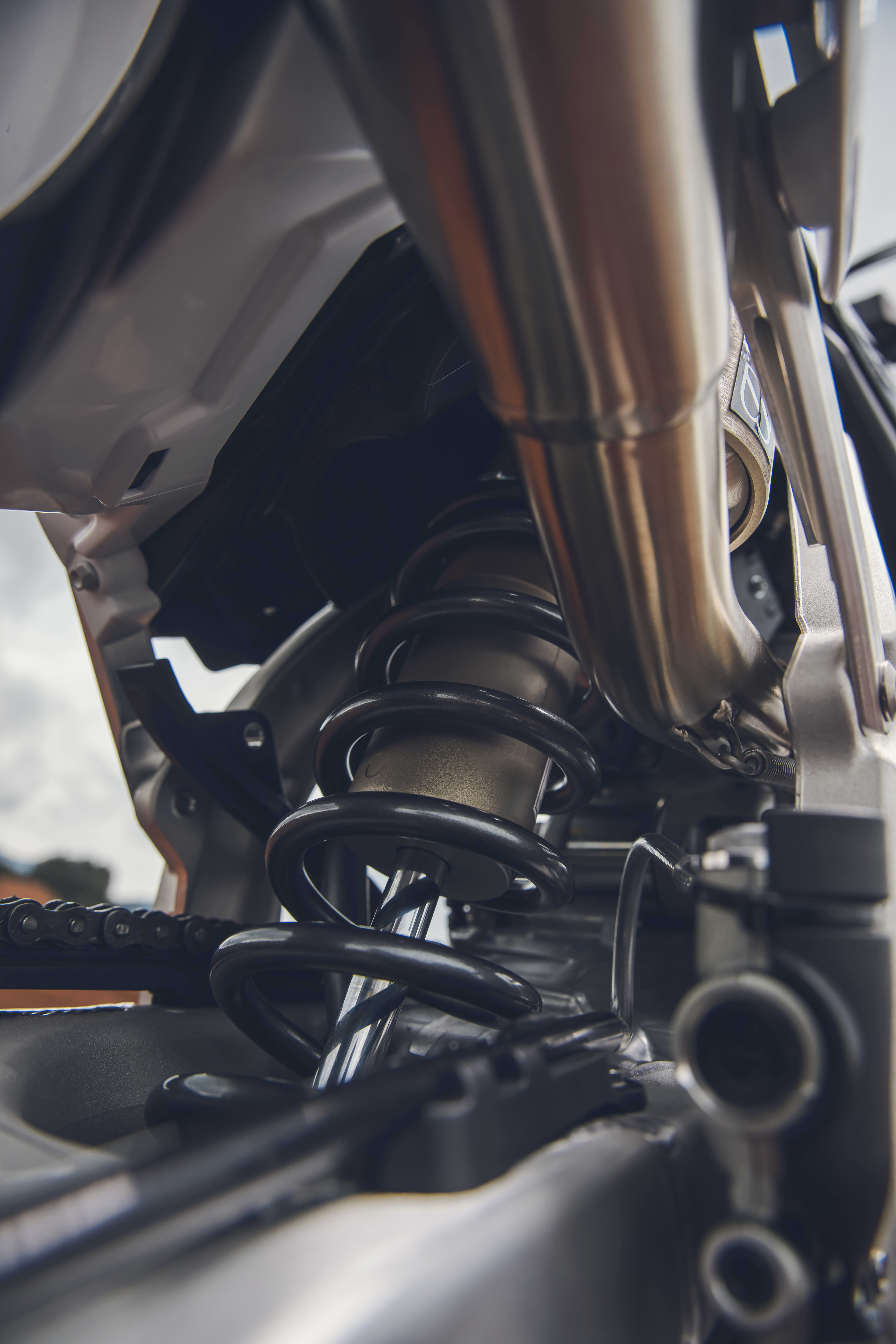 Close up of a rear shock absorber on a Triumph TF 250-X (MY26)