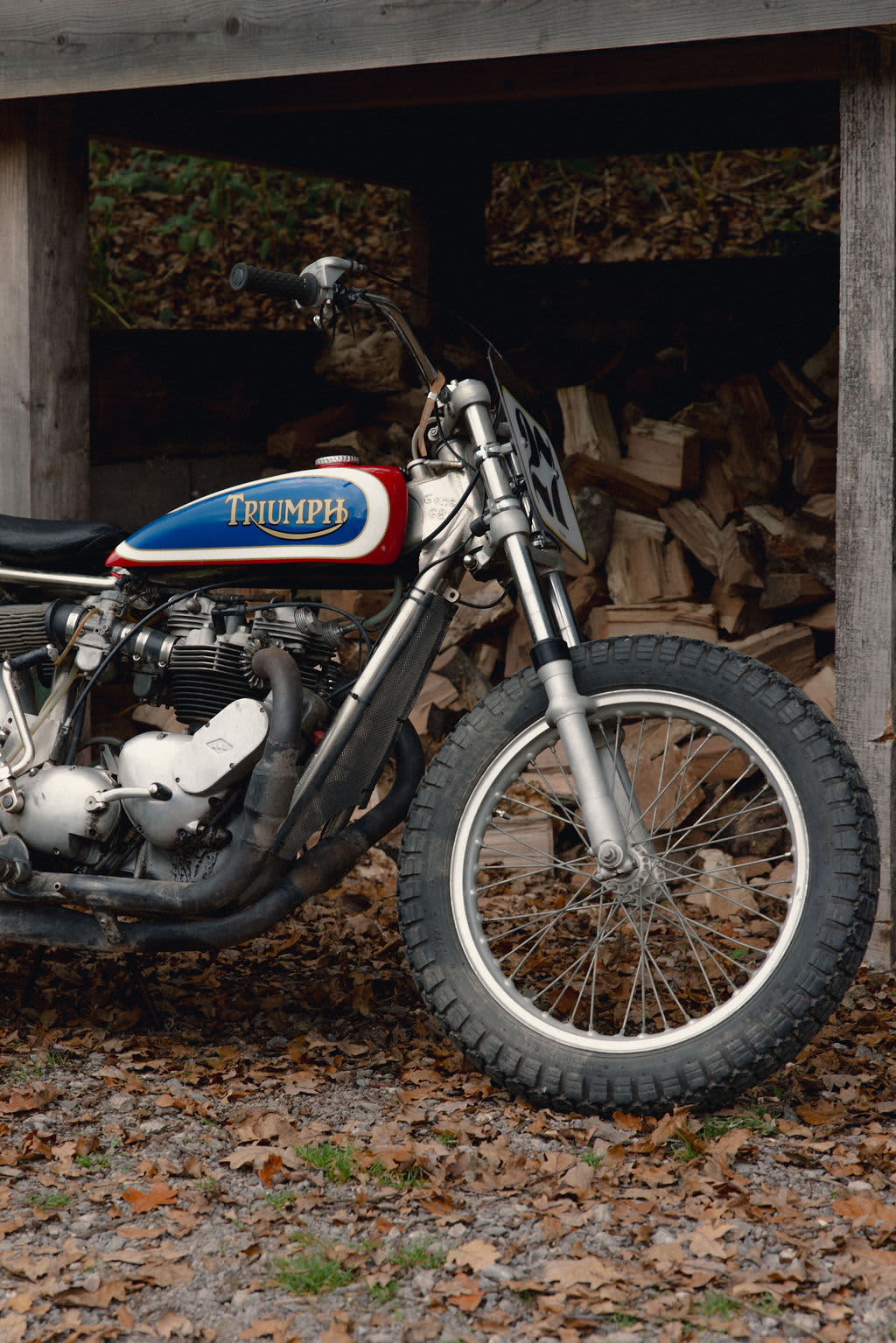 A side image of a old school Triumph retro bike