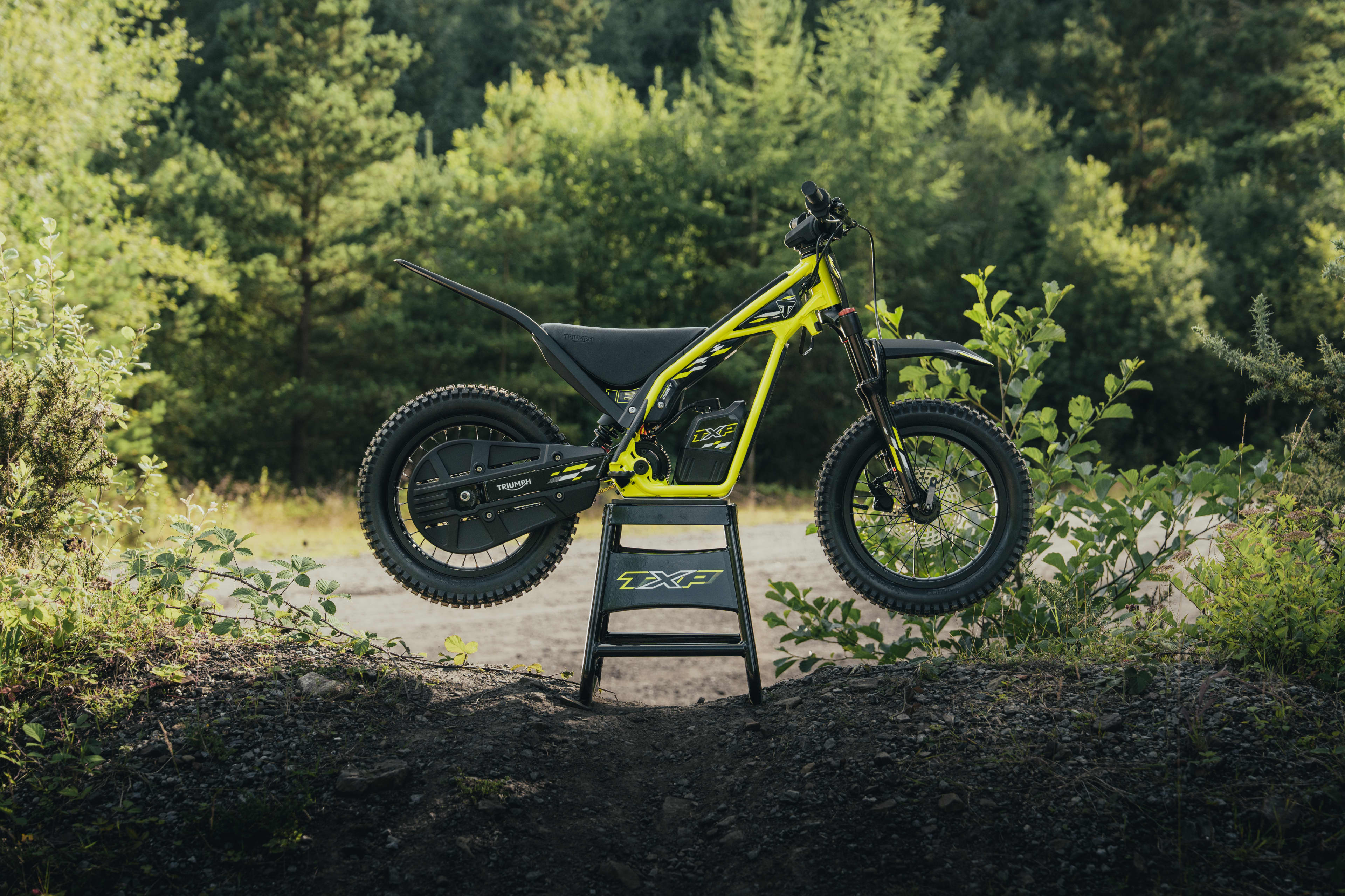 Static shot of the Triumph TXP-16 powered by OSET bike parked up on the TXP stand.