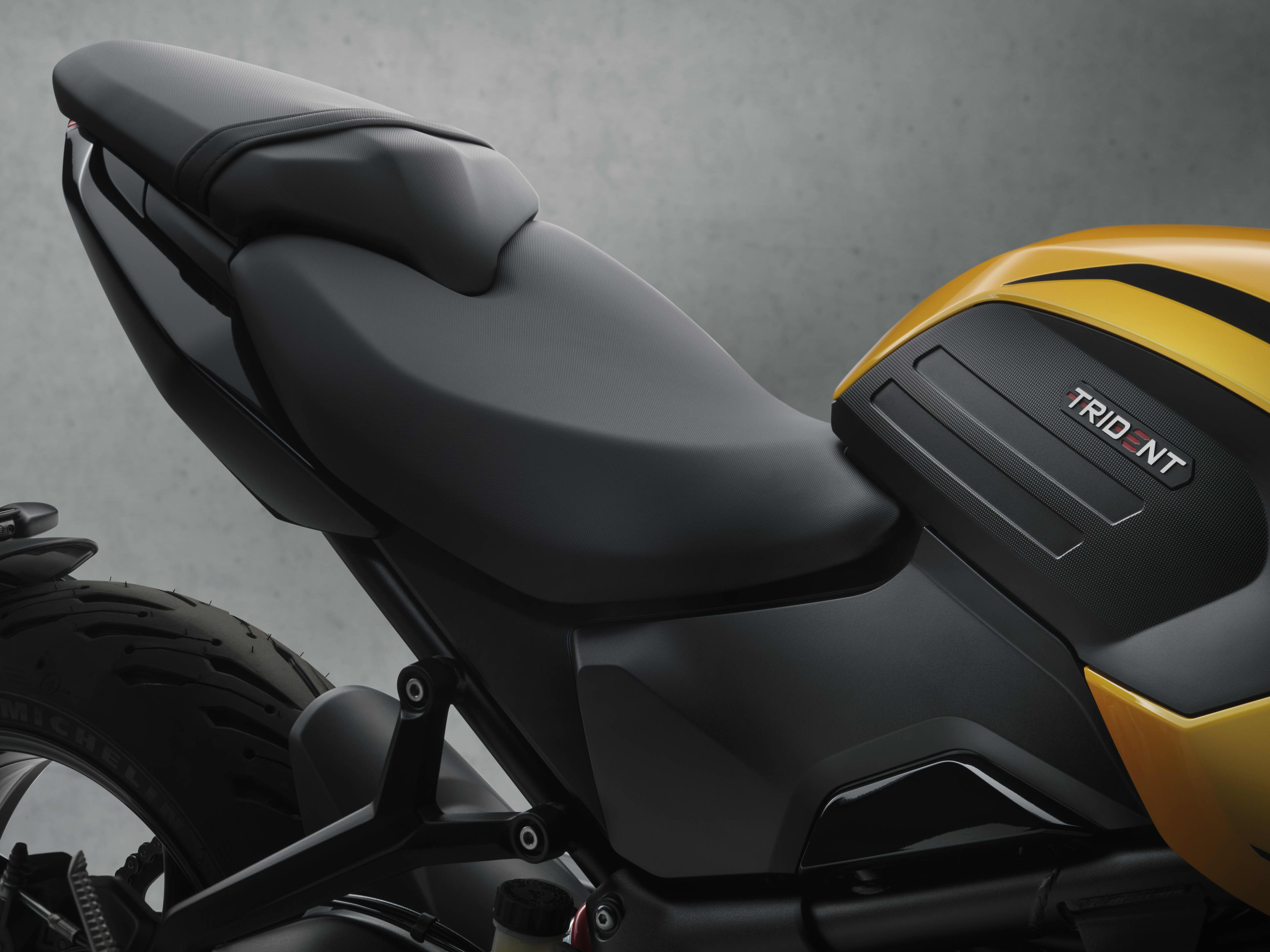Right side close up of Trident 660 tank in Cosmic yellow