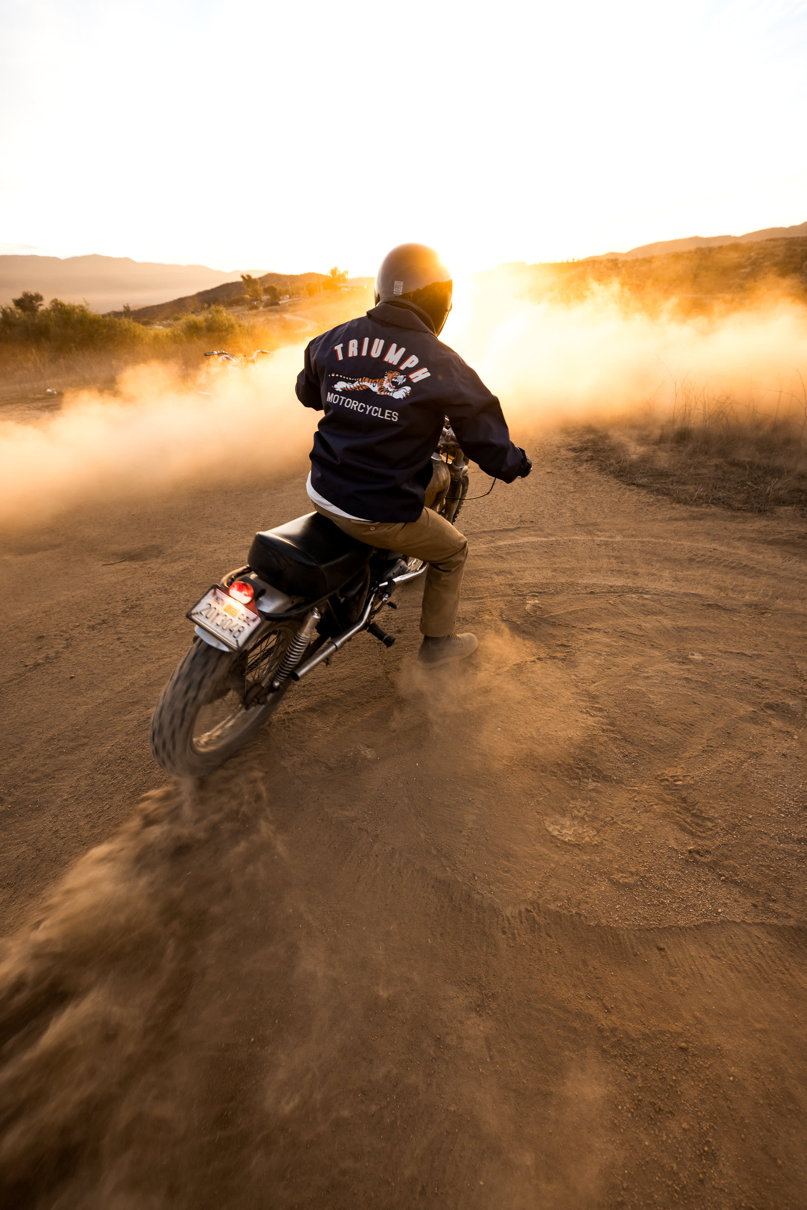 Man walking up stairs wearing Triumph Heritage 