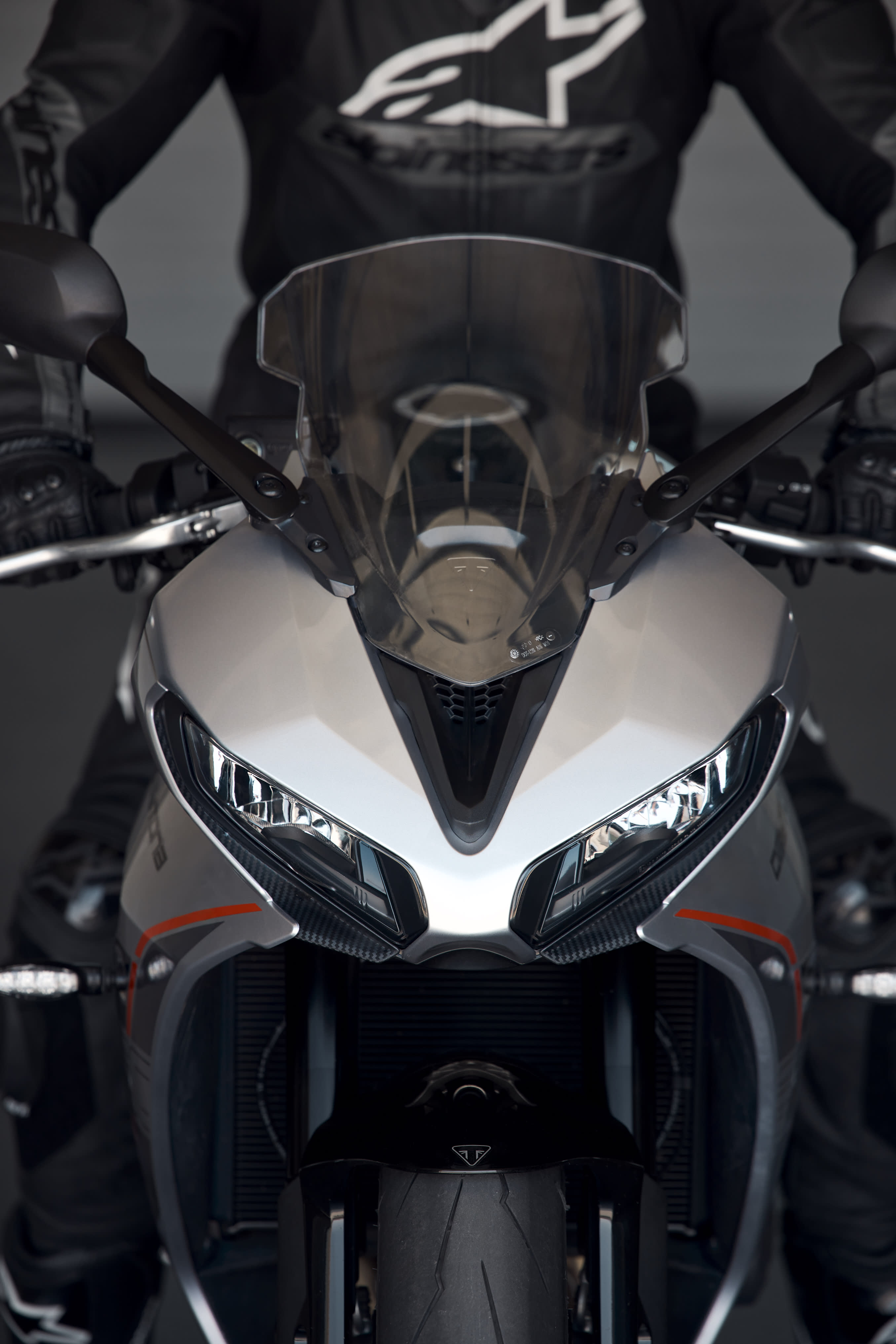 Front view of the Triumph Daytona 660 showing its windscreen and headlights