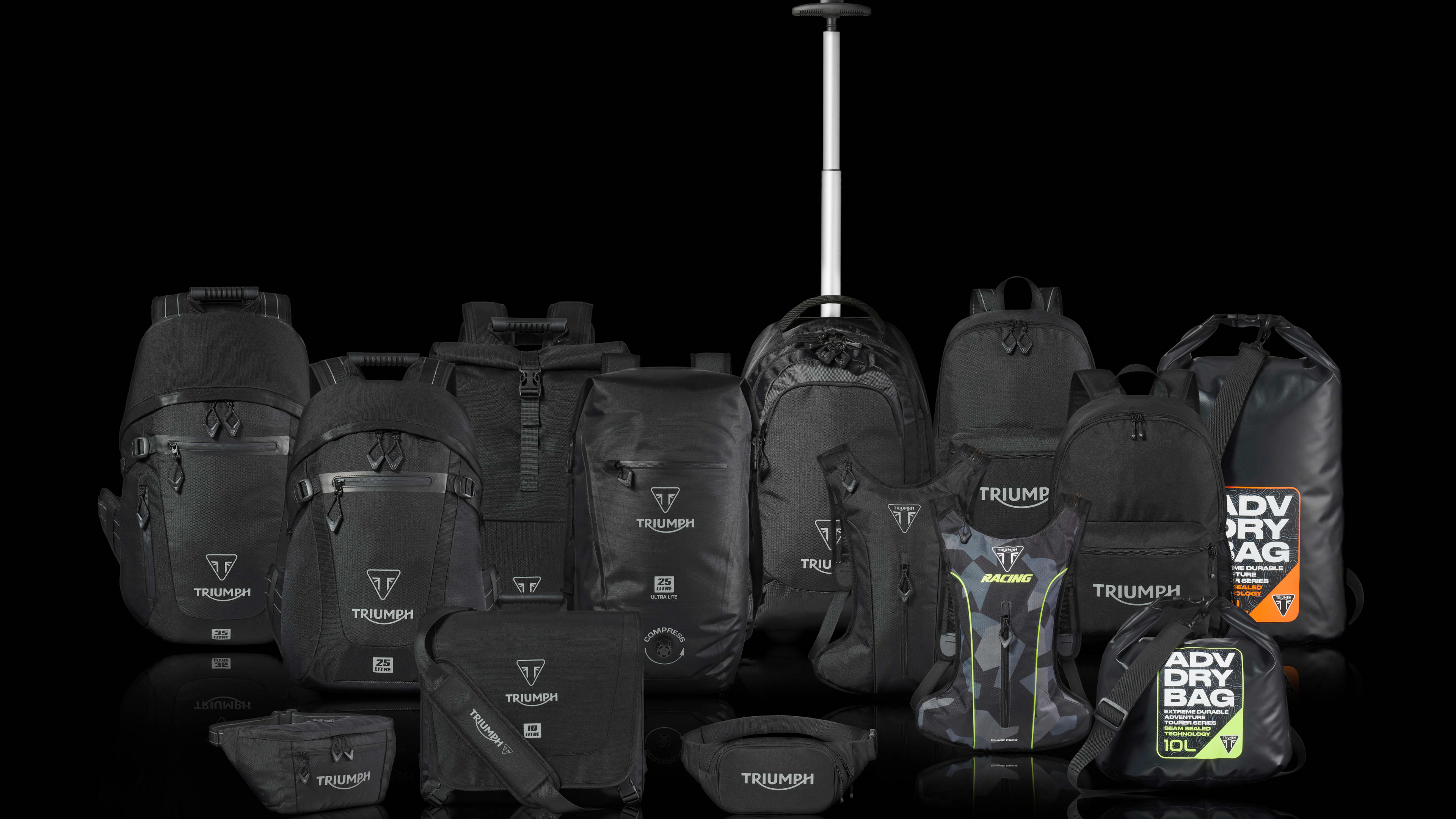 Triumph blue racing checkerboard long sleeve t-shirt on a rock