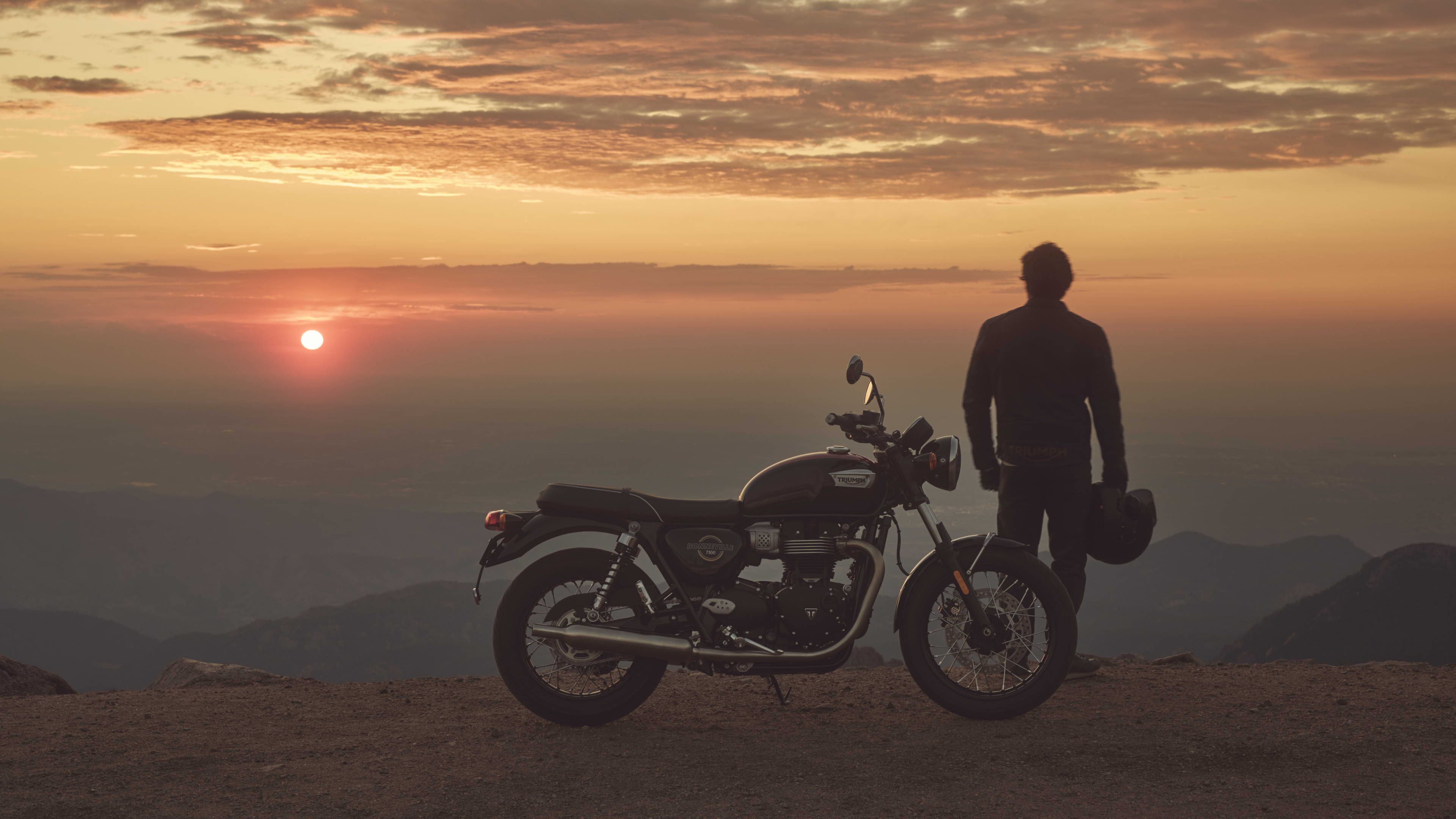 Triumph Bonneville T100 Motorcycle in sunset