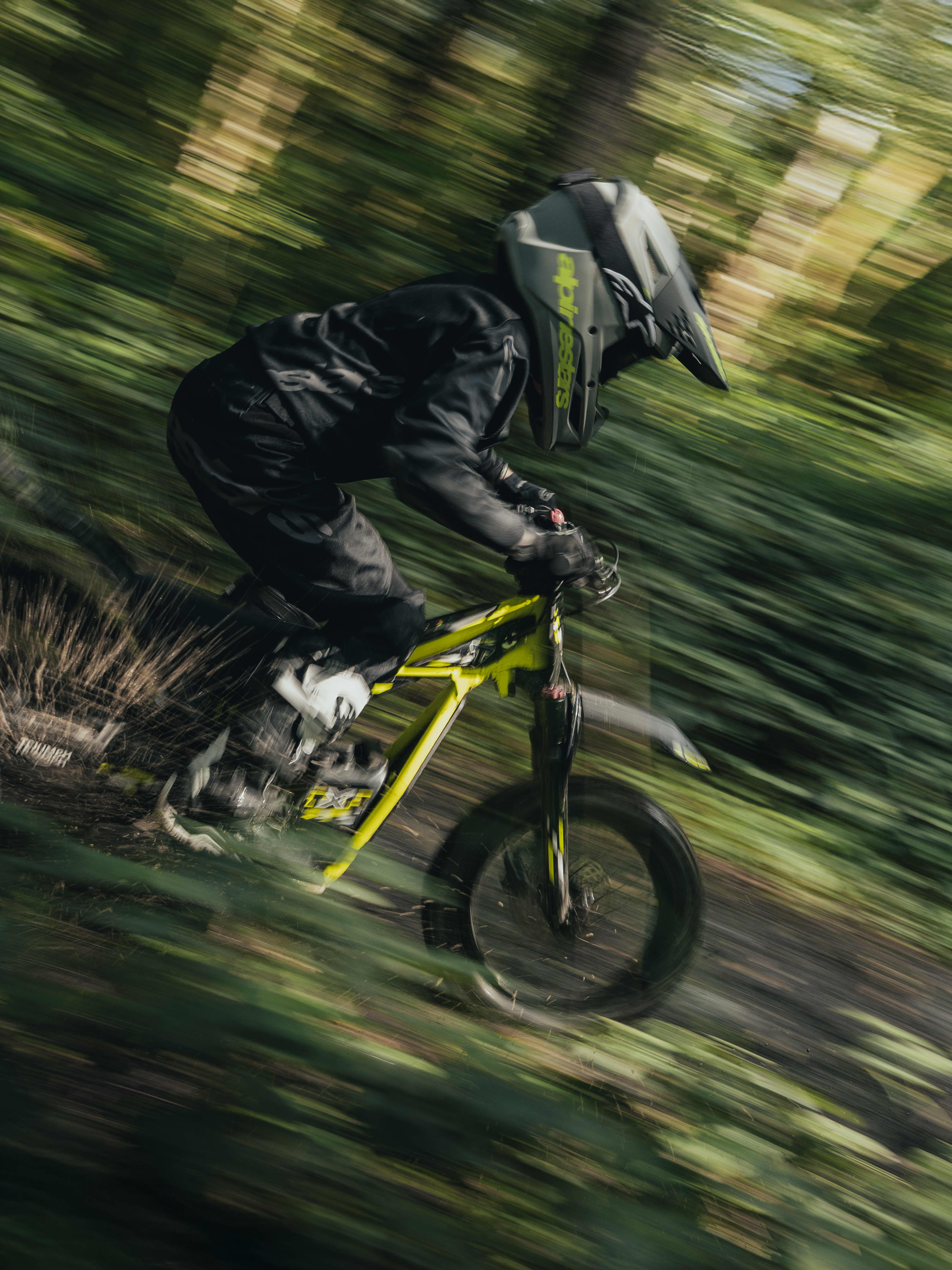 TRIUMPH TXP ELECTRIC OFF-ROAD YOUTH BIKES Young riders on Triumph TXP electric off-road motorcycles.
