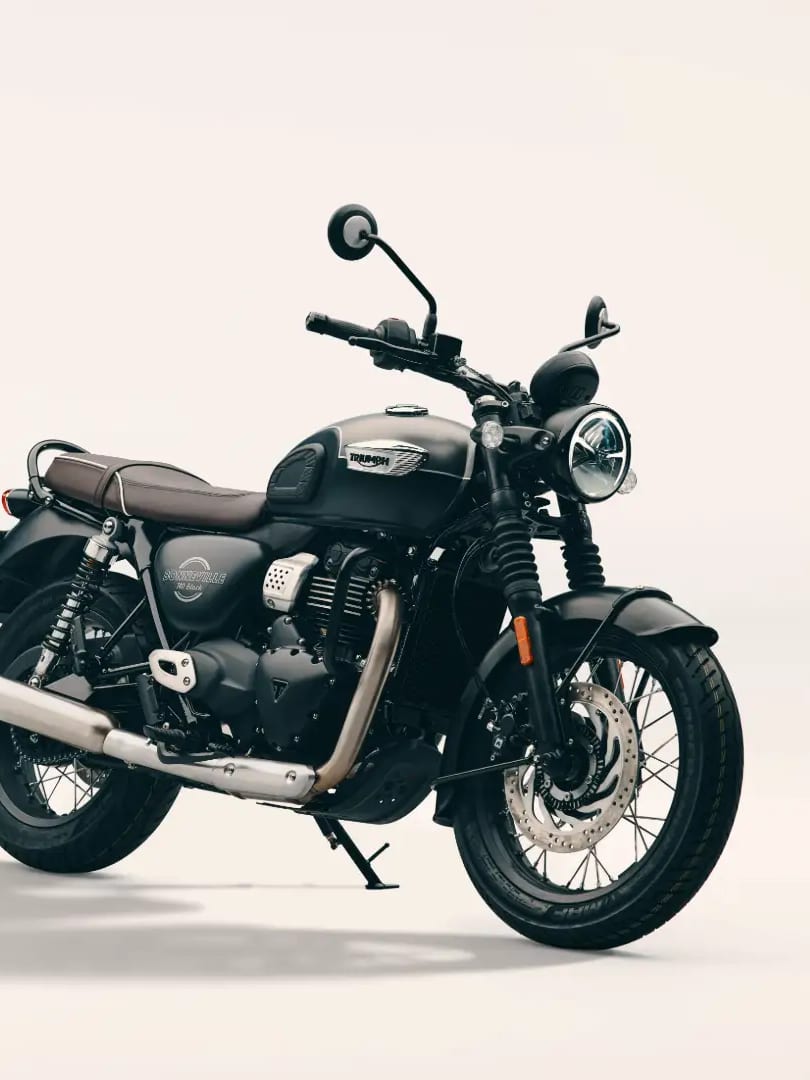 All new Bonneville T40 Black Studio shot of a satin grey and black Triumph Bonneville T40 Black motorcycle parked on a light background.