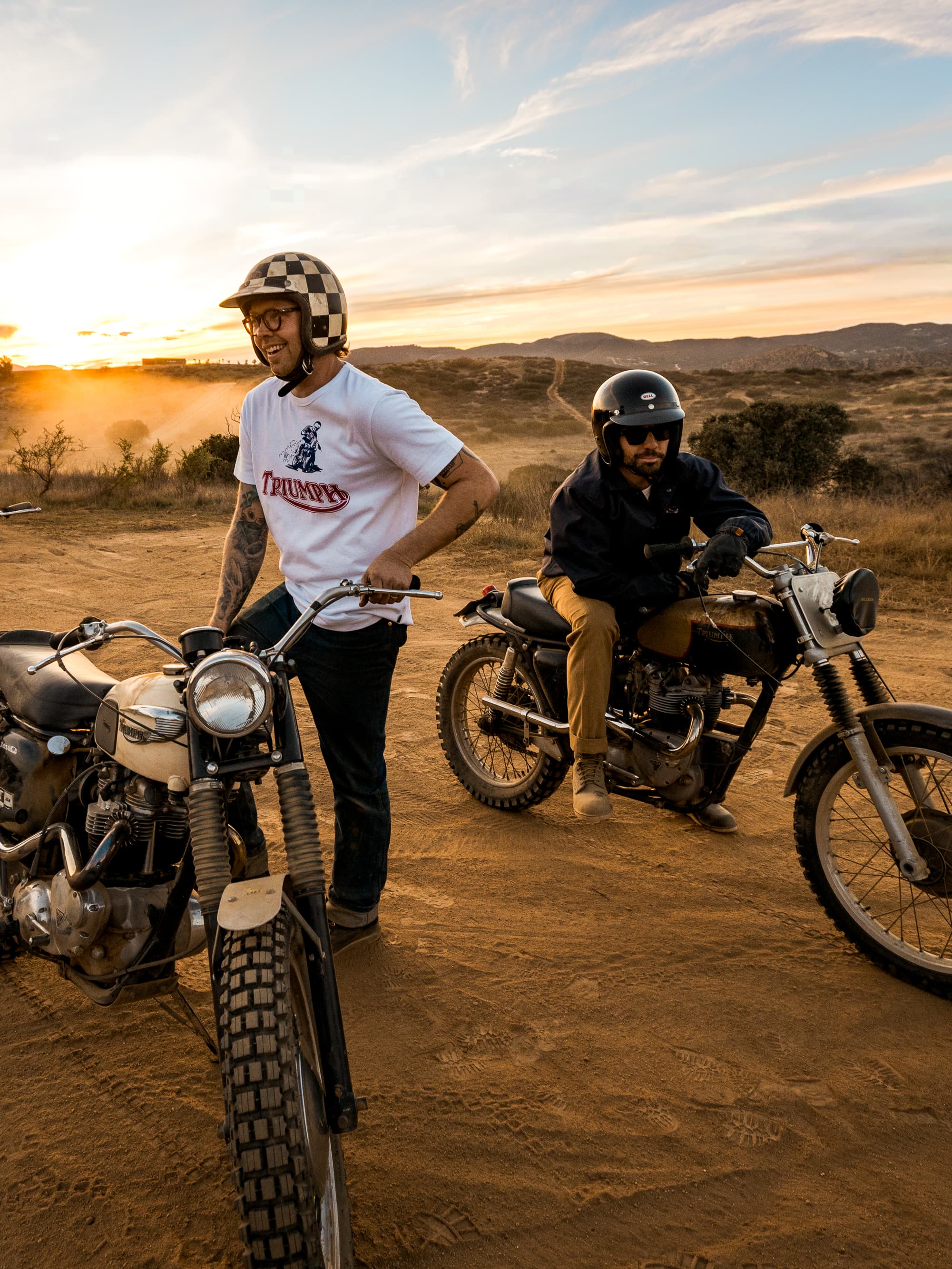 Three men on Triumph Motorcycles in the desert wearing Triumph Heritage Clothing