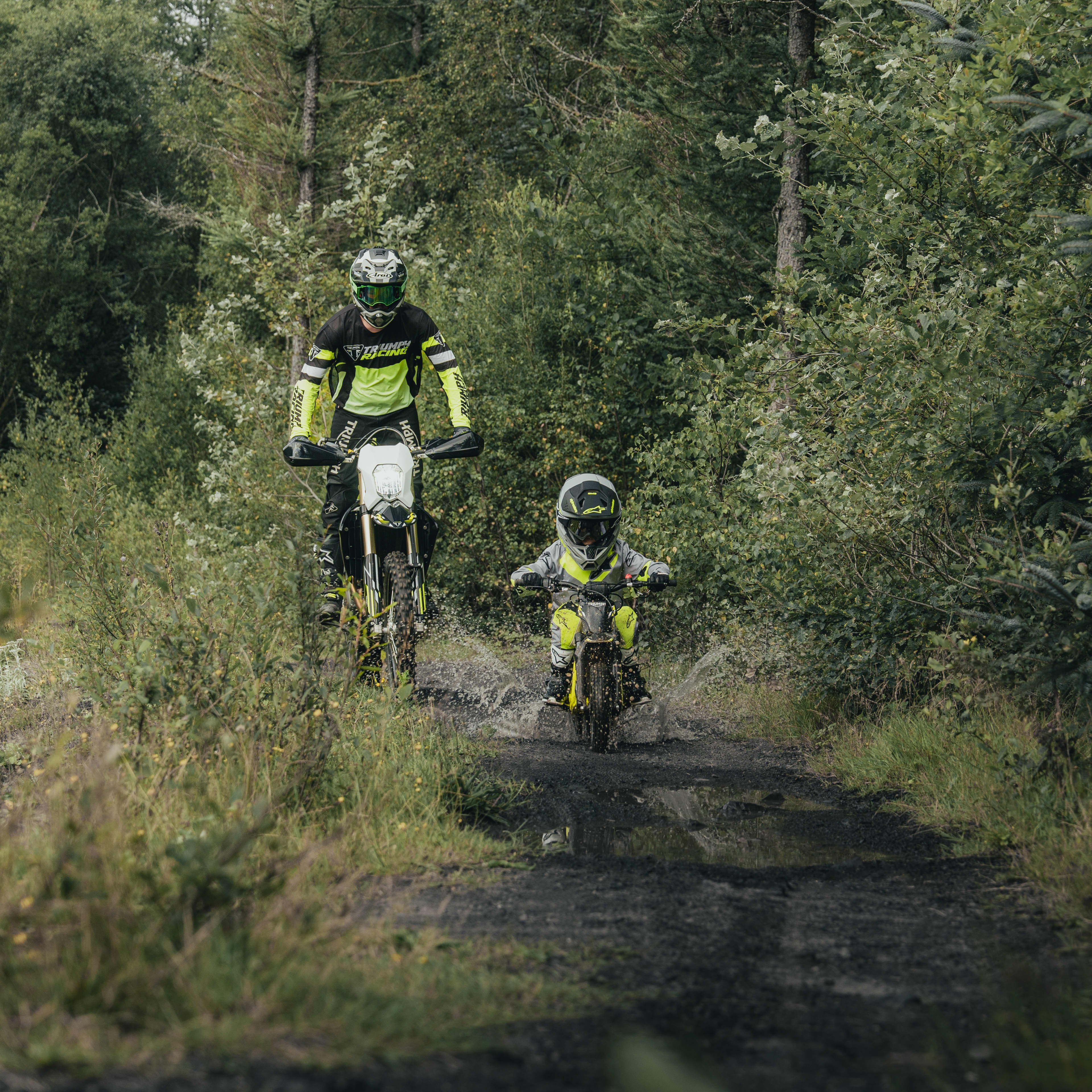 Premium components, real riding feel Higher range with the smaller model of the TXP riding through a forest track.