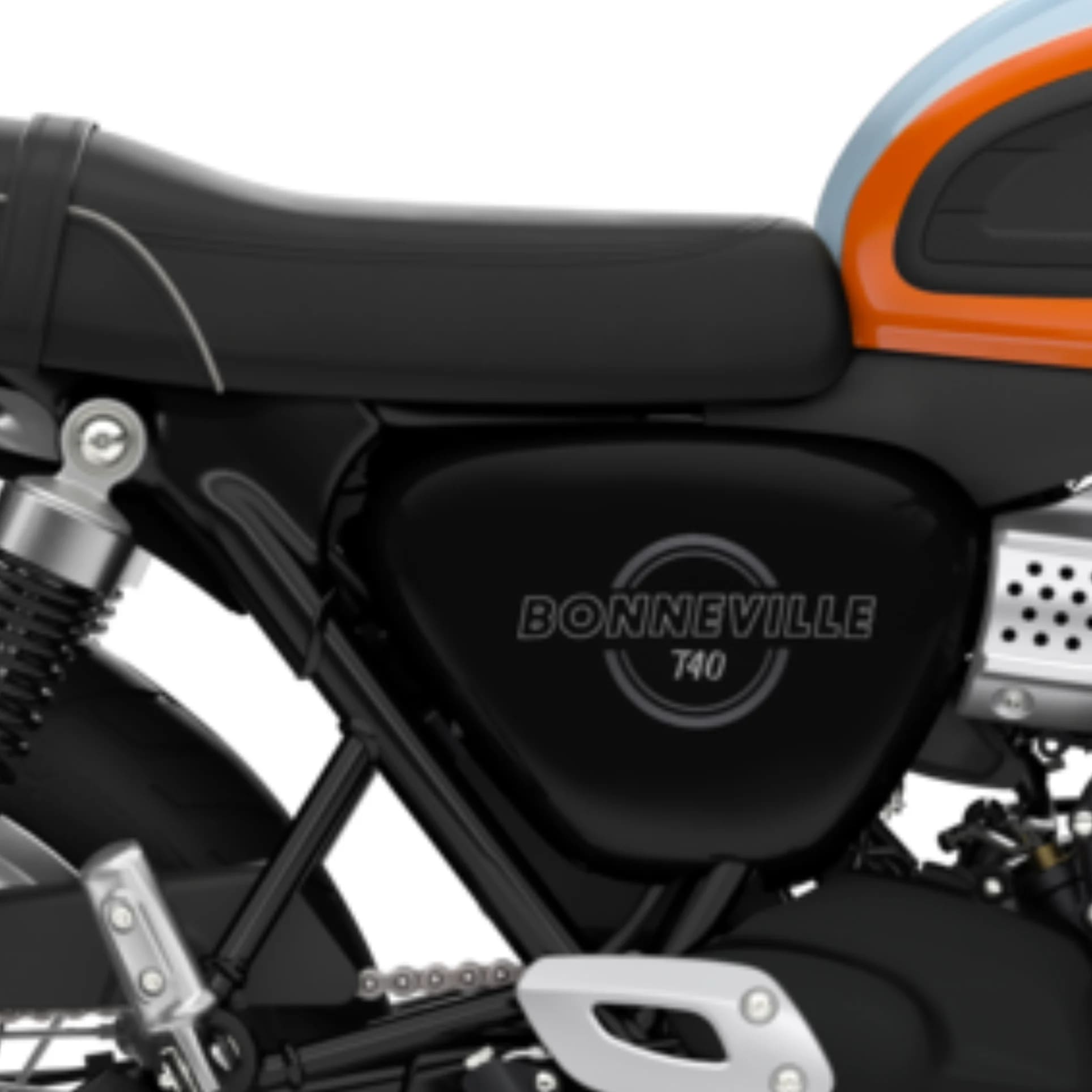 Élément incontournable des motos Bonneville, la selle classique type café racer renforce le caractère authentique de la T40, tout en lui offrant du confort au quotidien. Un généreux rembourrage en mousse assure le confort du pilote et du passager, tandis que la selle côtelée apporte une touche rétro. À l’arrière de la selle type café racer à finition noire de la Bonneville T40, le logo Triumph apporte une touche finale et évoque clairement l’héritage.