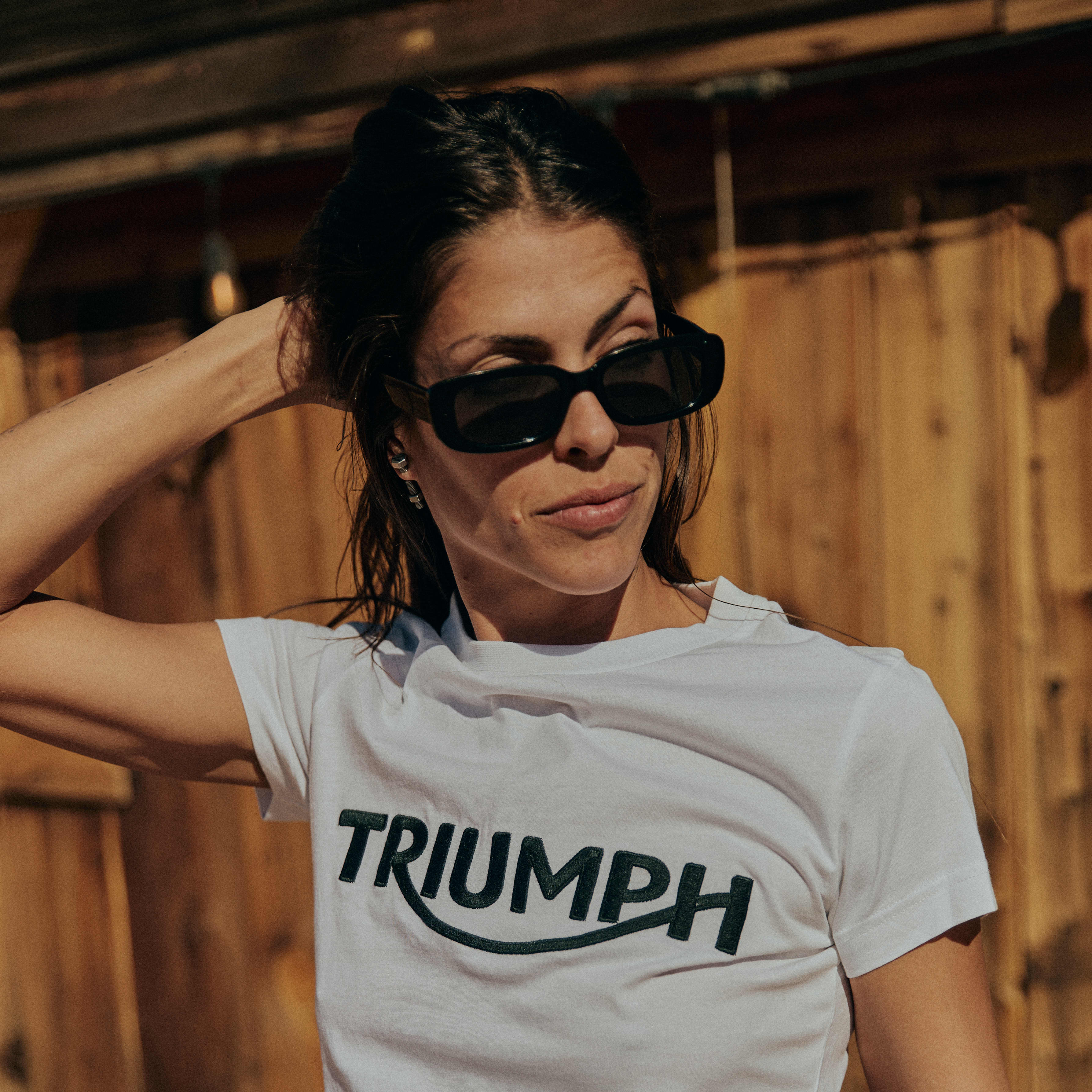 Women wearing sunglasses and Triumph Motorcycle White T-shirt