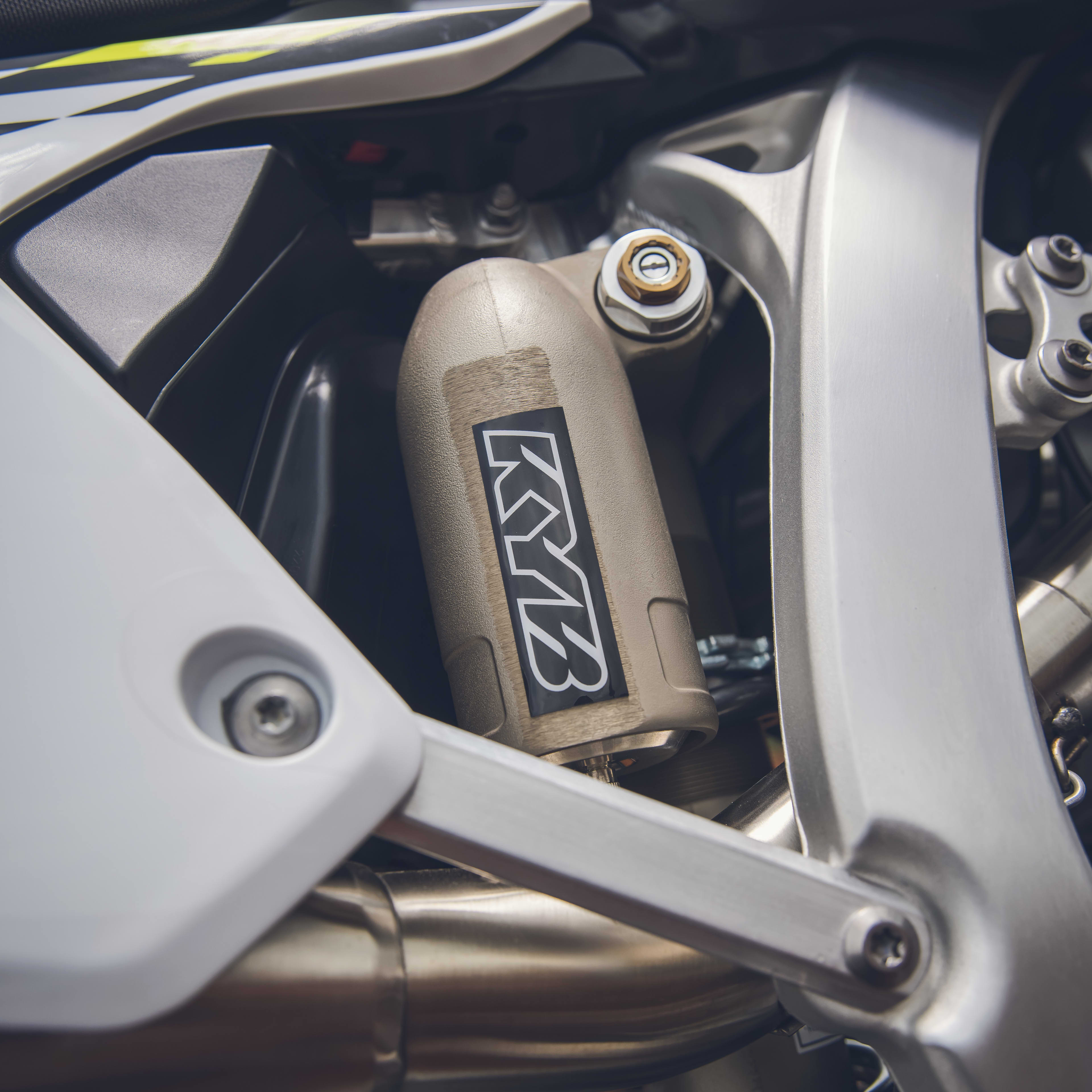 Top-tier KYB suspension delivers adjustability and race-day precision.
