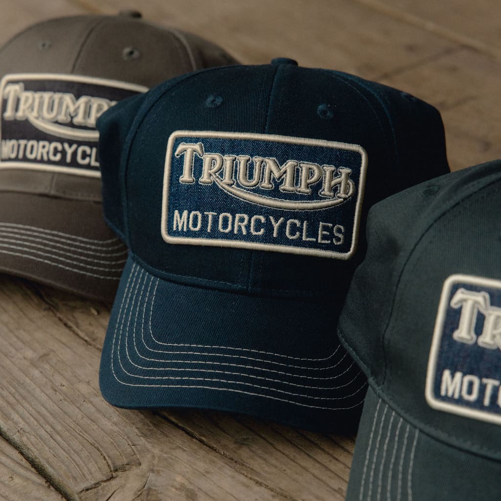 Three Triumph Motorcycles trucker caps in a row